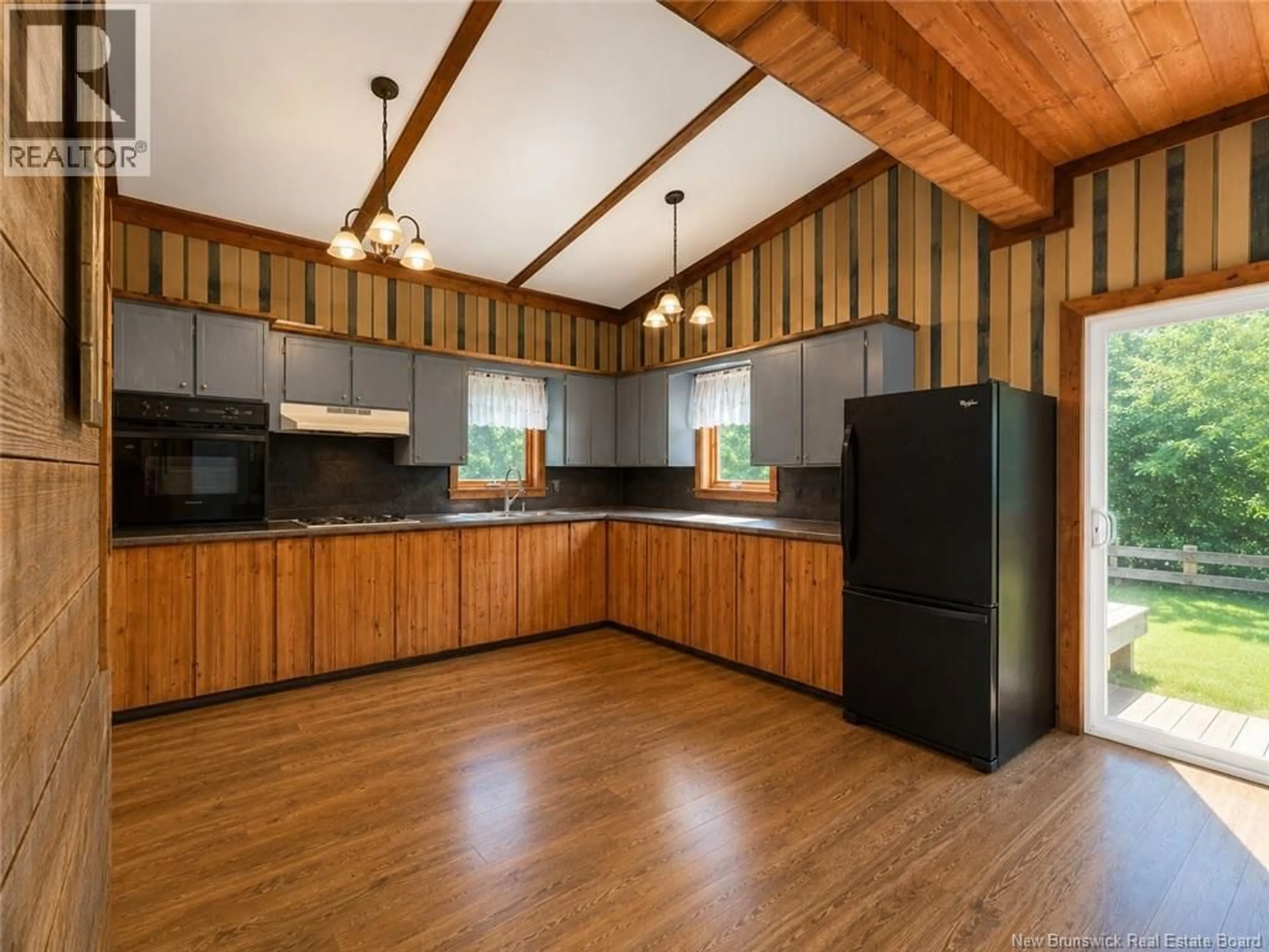 Open concept kitchen, wood/laminate floor for 230 WILSON POINT, Miscou New Brunswick E8T4R4
