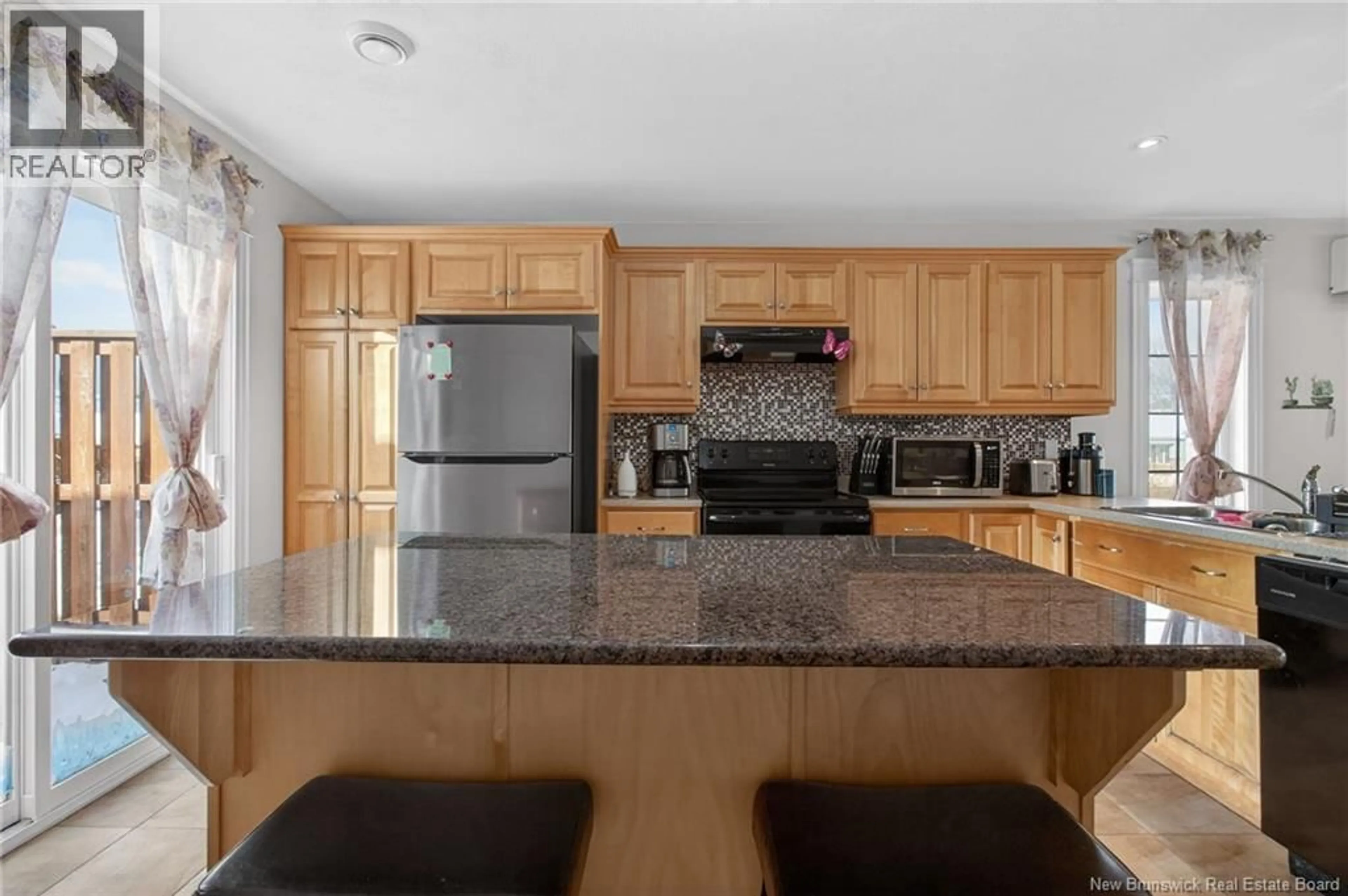 Open concept kitchen, ceramic/tile floor for 66 CROASDALE, Moncton New Brunswick E1E0A8