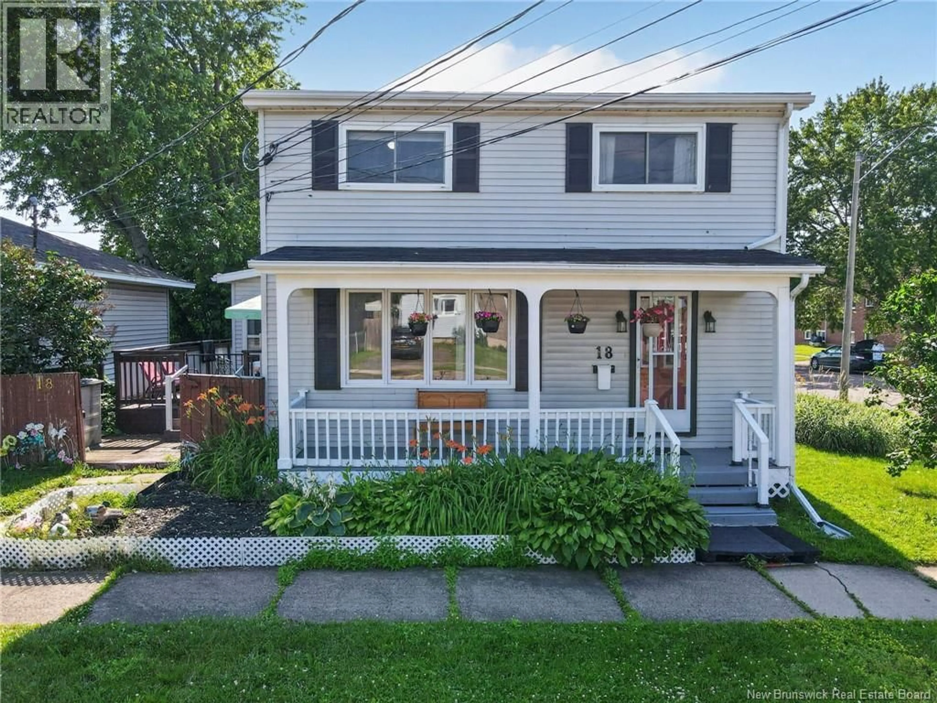 Home with vinyl exterior material, street for 18 ATKINSON AVENUE, Moncton New Brunswick E1C7S1