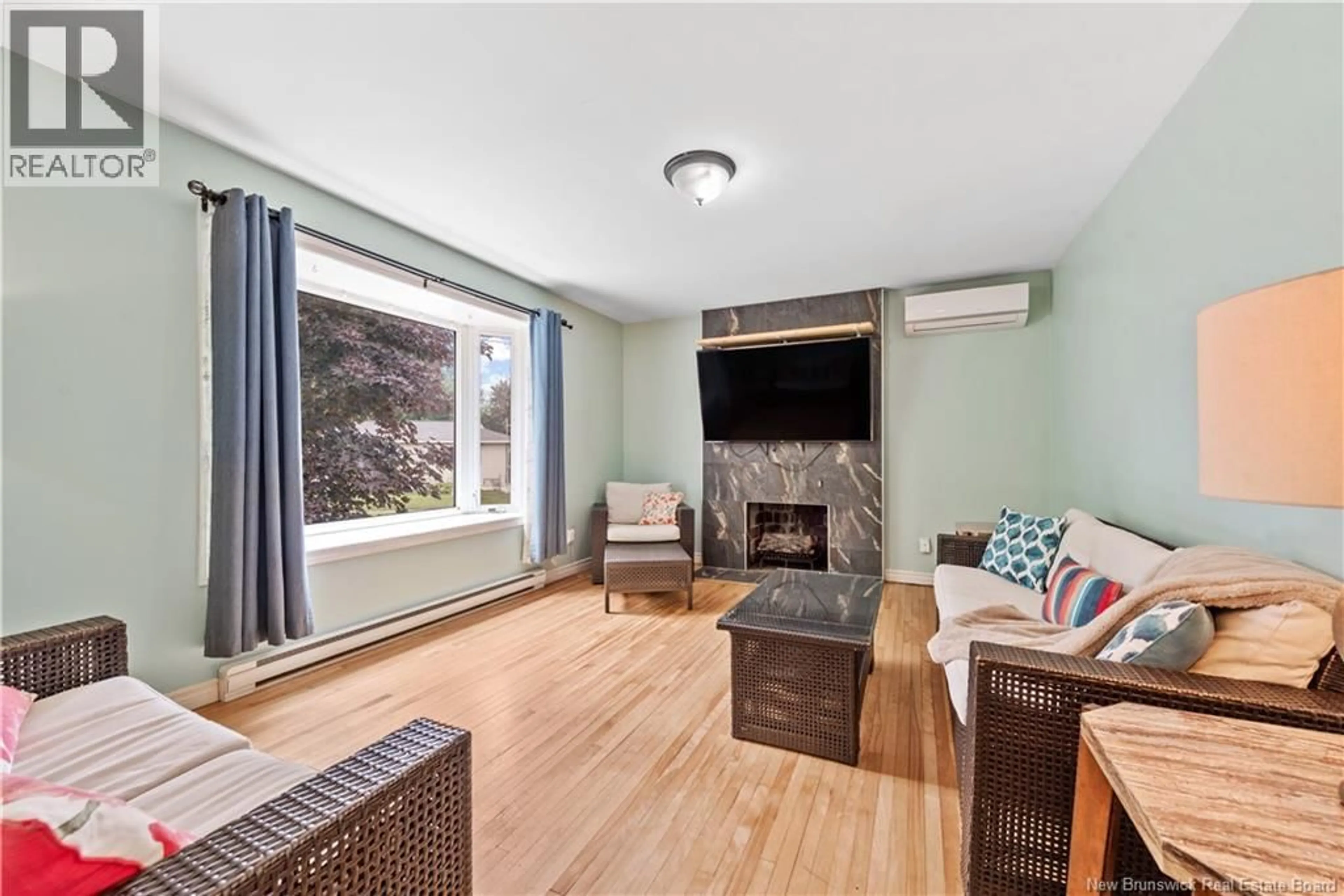 Living room with furniture, wood/laminate floor for 3 DOWNSVIEW AVENUE, Moncton New Brunswick E1A4C4
