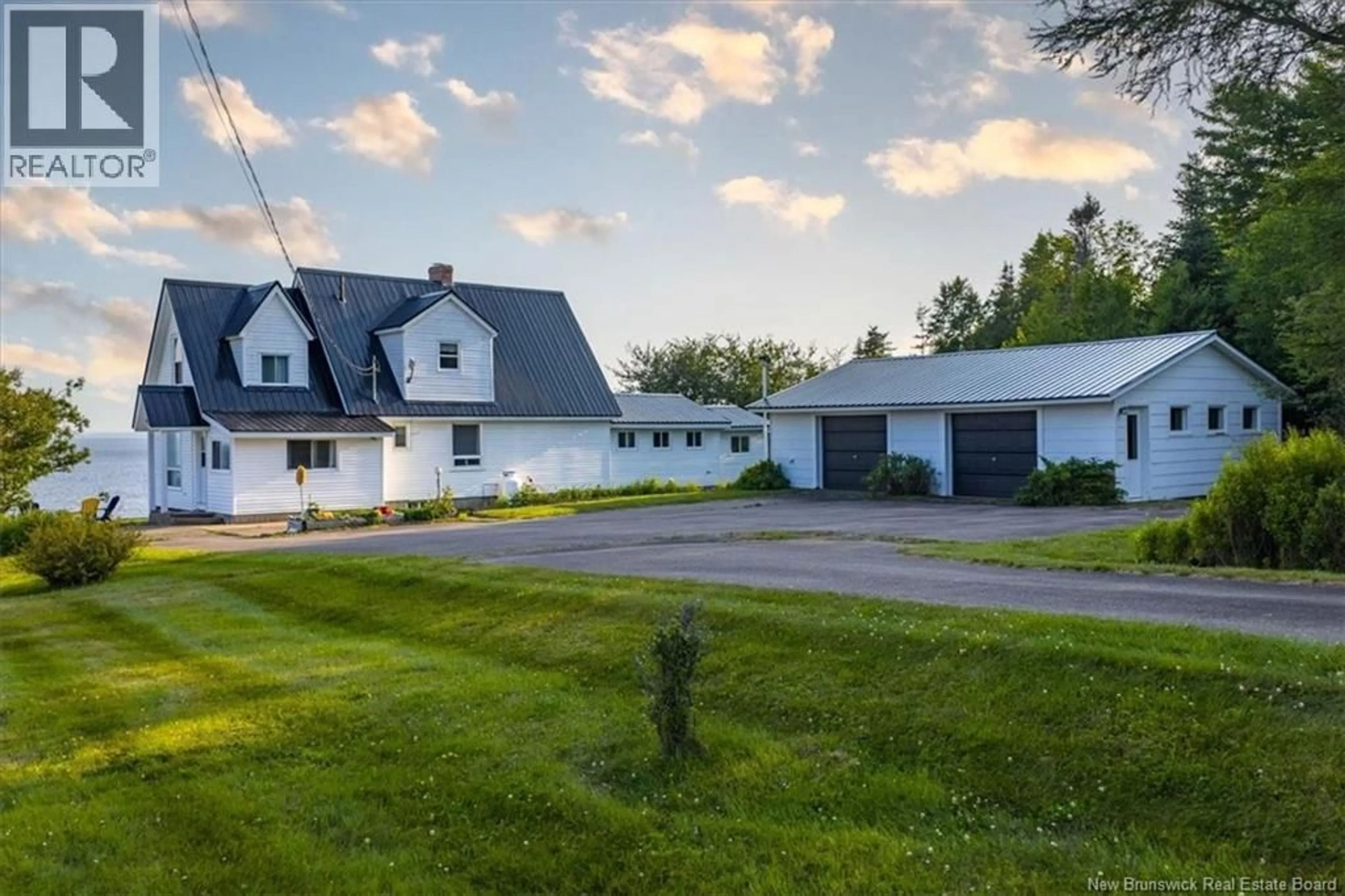 A pic from outside/outdoor area/front of a property/back of a property/a pic from drone, street for 280 HOLTS POINT ROAD, Bocabec New Brunswick E5B3N4