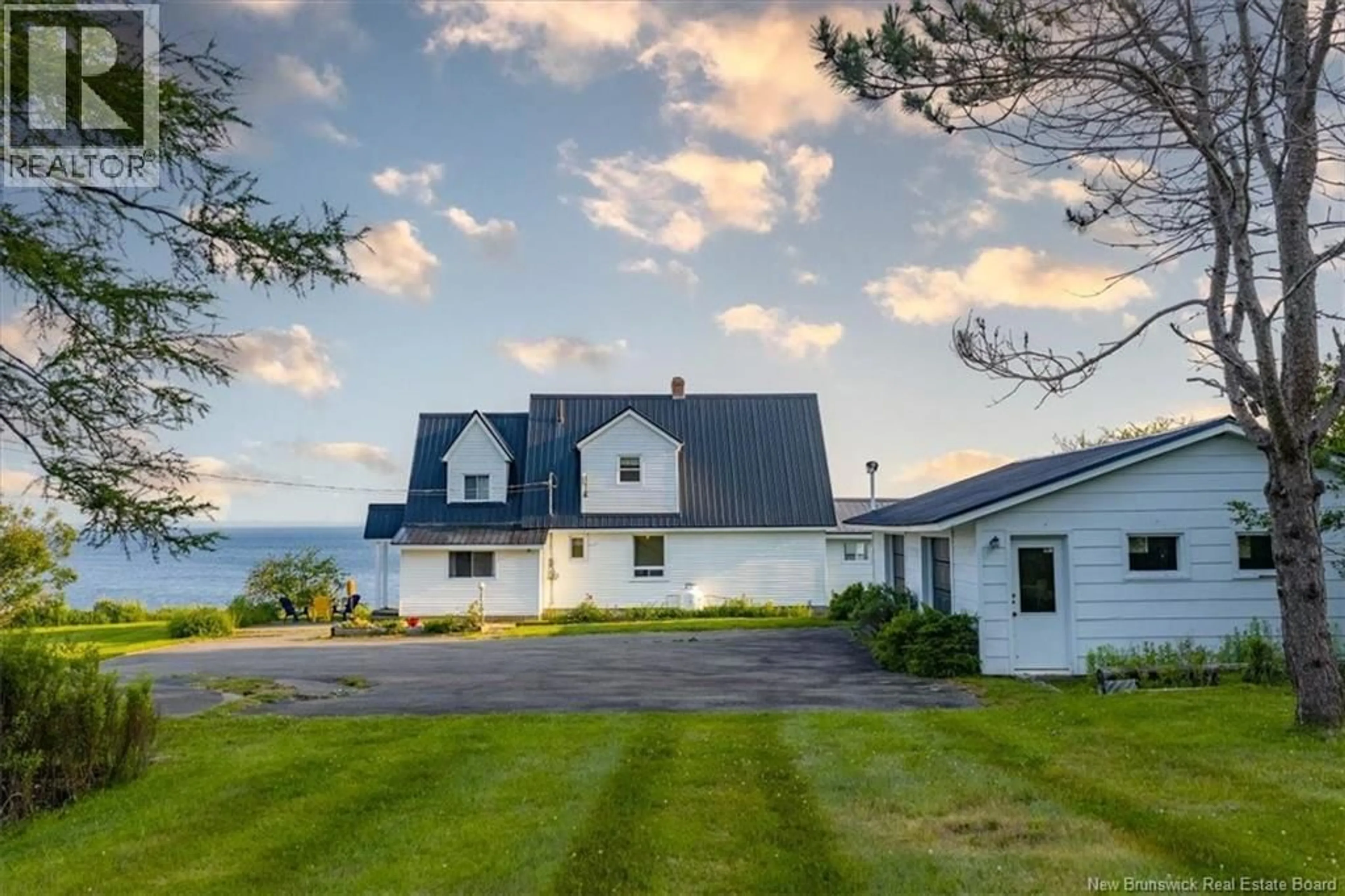 A pic from outside/outdoor area/front of a property/back of a property/a pic from drone, unknown for 280 HOLTS POINT ROAD, Bocabec New Brunswick E5B3N4