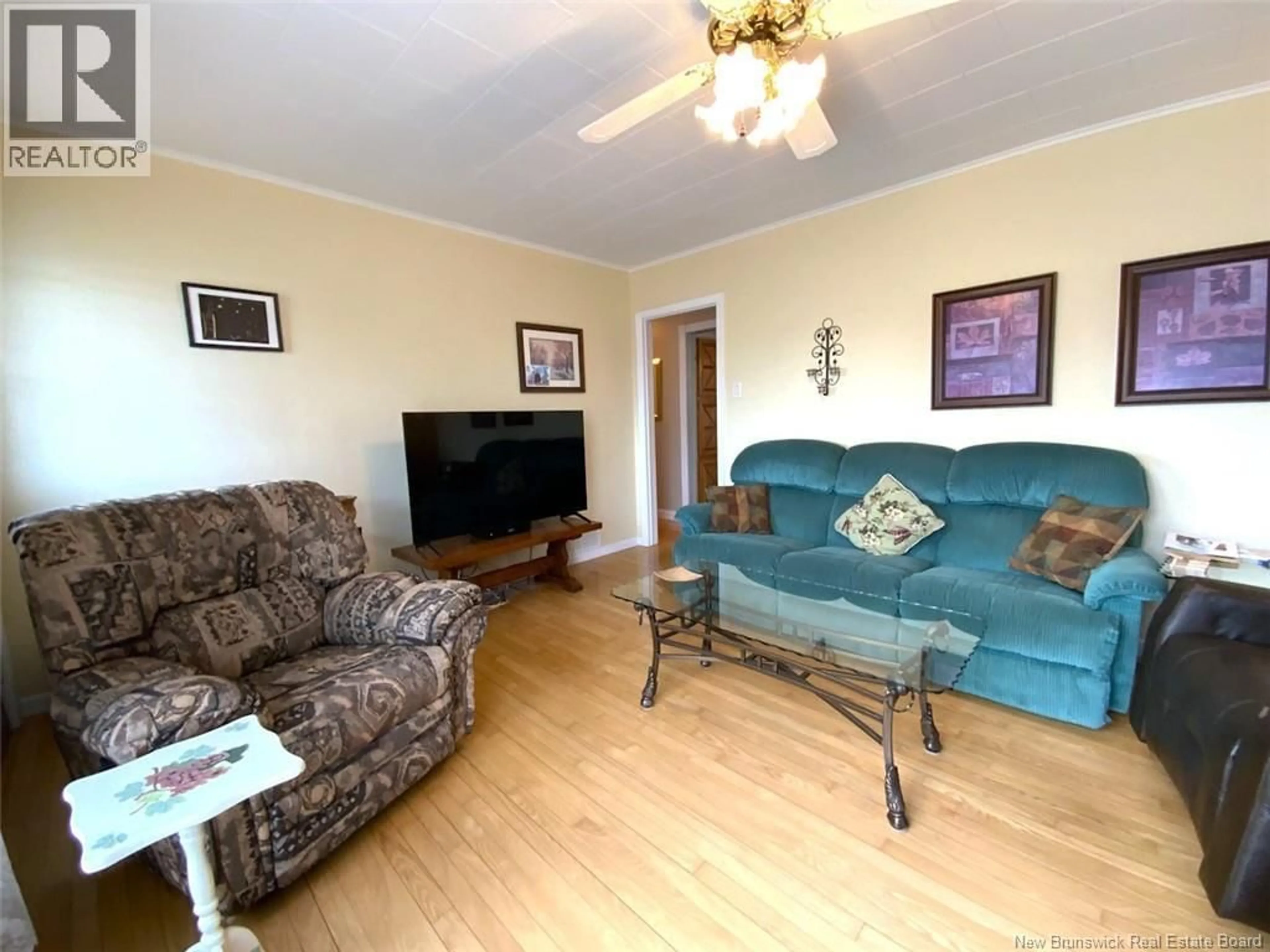 Living room with furniture, wood/laminate floor for 41 MAZEROLLE STREET, Saint-Basile New Brunswick E7C1E7