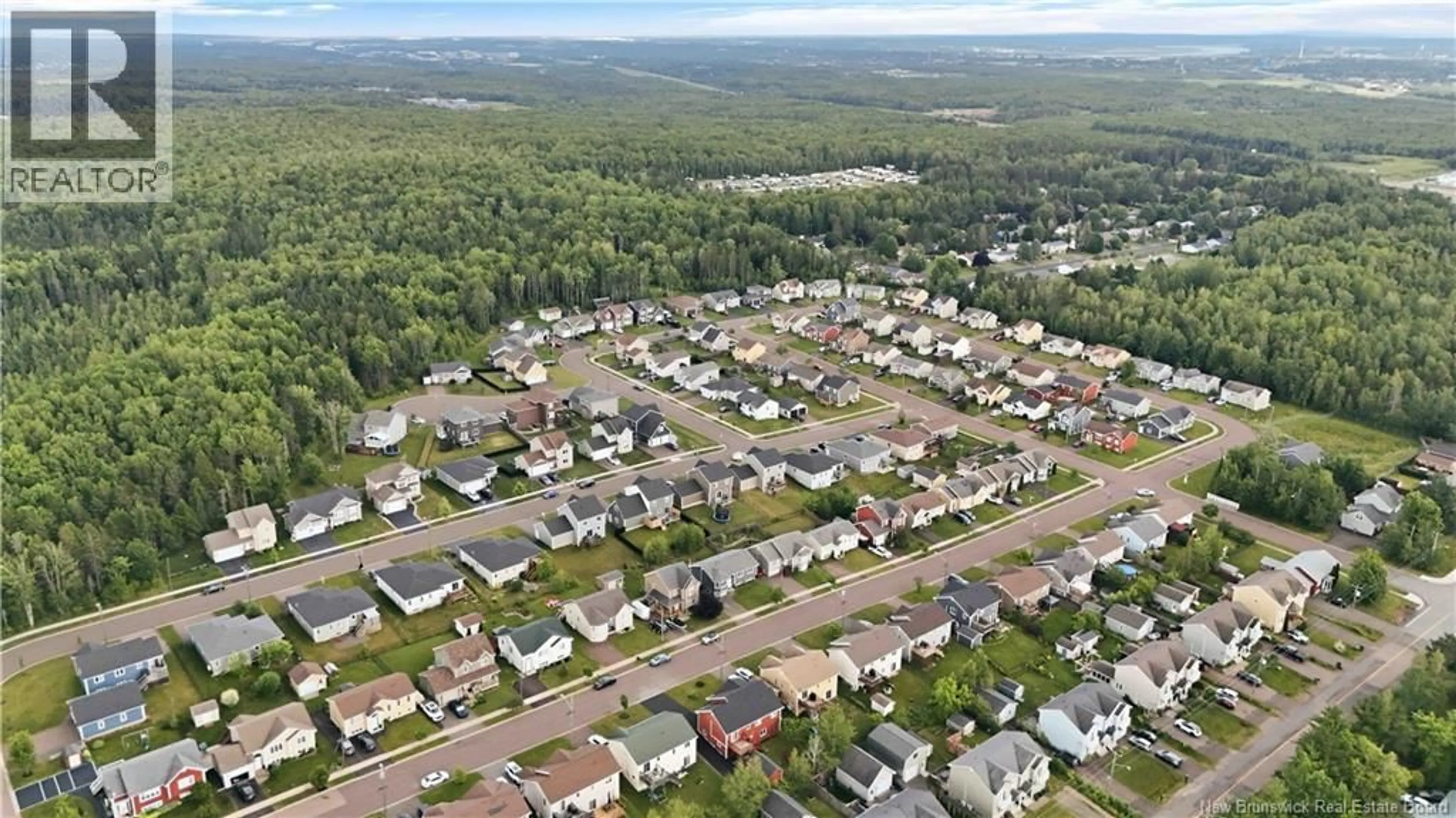 A pic from outside/outdoor area/front of a property/back of a property/a pic from drone, street for 58 MONIQUE STREET, Moncton New Brunswick E1G0R8