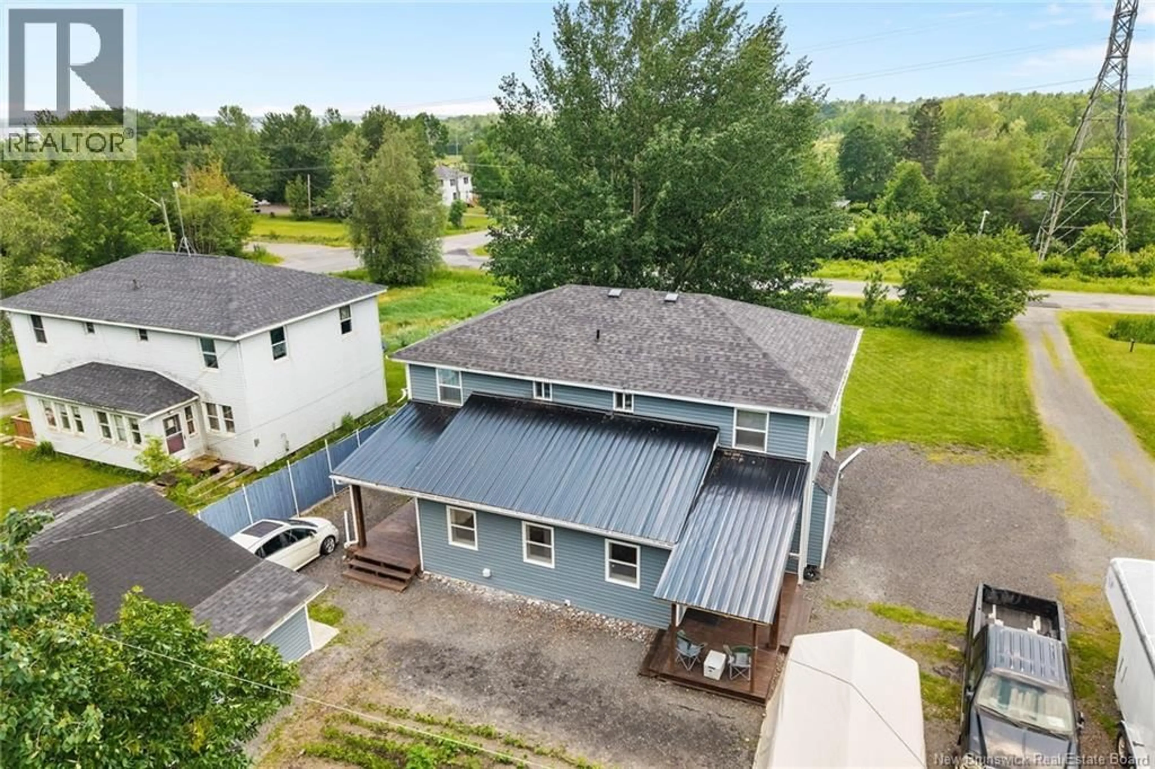 A pic from outside/outdoor area/front of a property/back of a property/a pic from drone, building for 8 - 6 HARBOUR STREET, Newcastle Creek New Brunswick E4B2K5