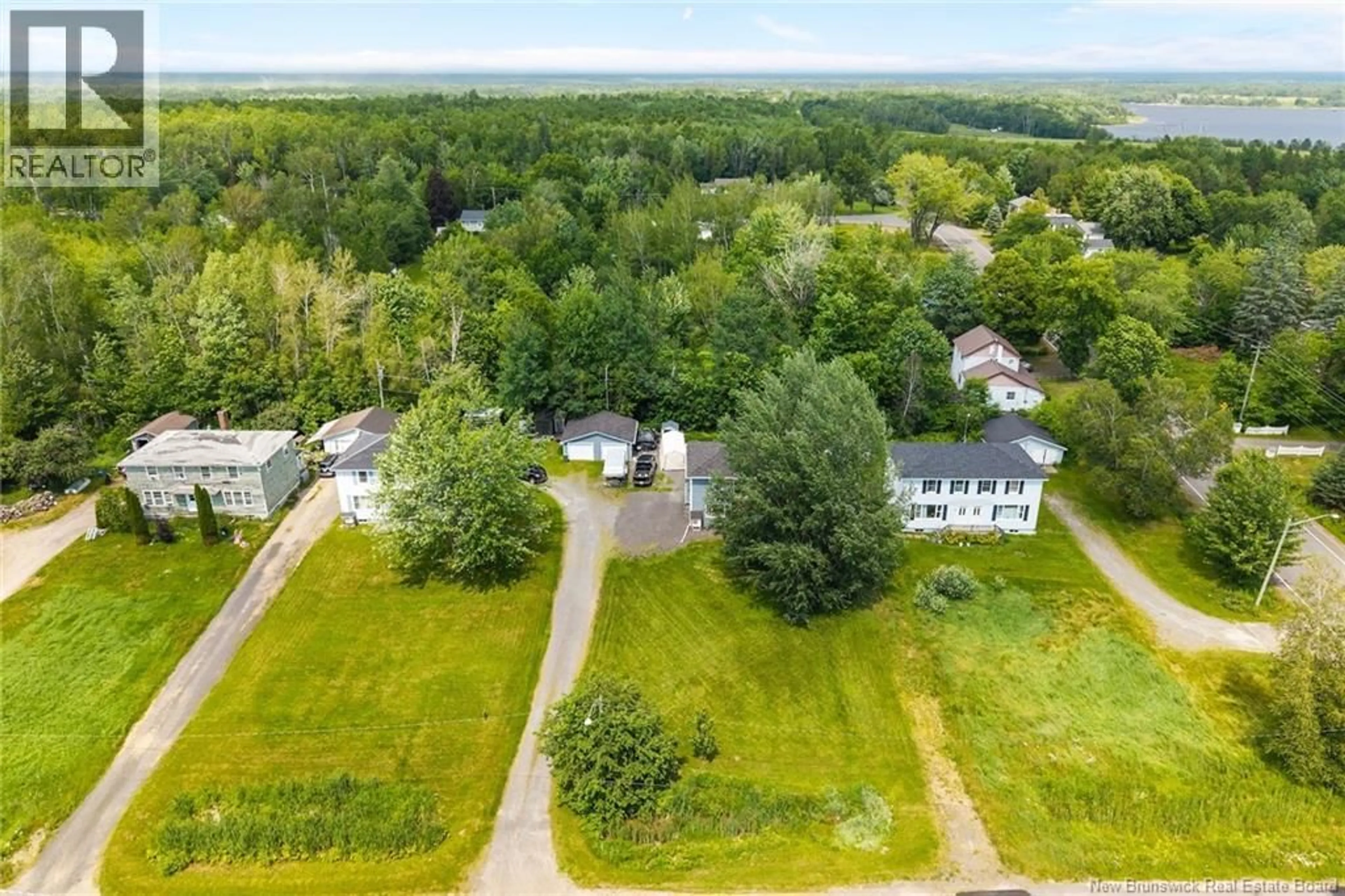 A pic from outside/outdoor area/front of a property/back of a property/a pic from drone, water/lake/river/ocean view for 8 - 6 HARBOUR STREET, Newcastle Creek New Brunswick E4B2K5