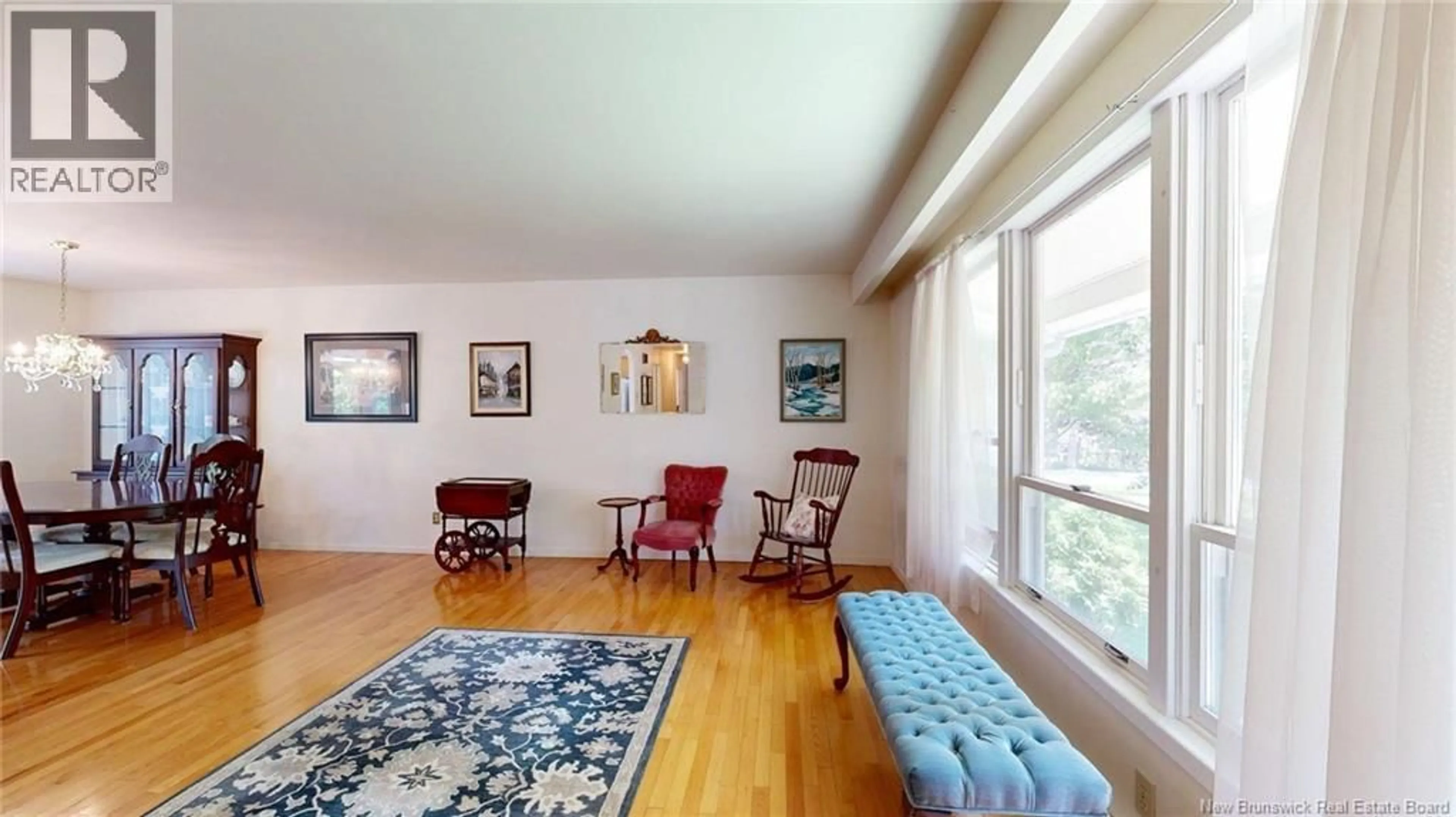 Living room with furniture, wood/laminate floor for 49 CEDAR RIDGE BOULEVARD, Quispamsis New Brunswick E2E4K6