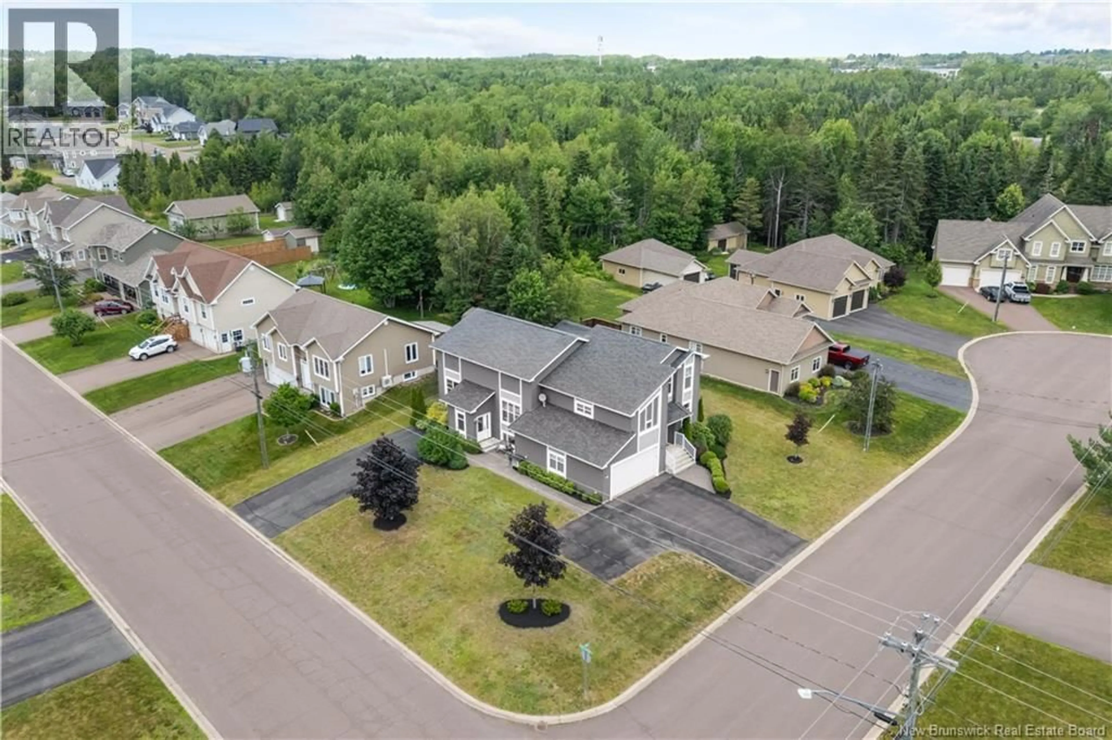 A pic from outside/outdoor area/front of a property/back of a property/a pic from drone, street for 10 YVES COURT, Dieppe New Brunswick E1A0Z7