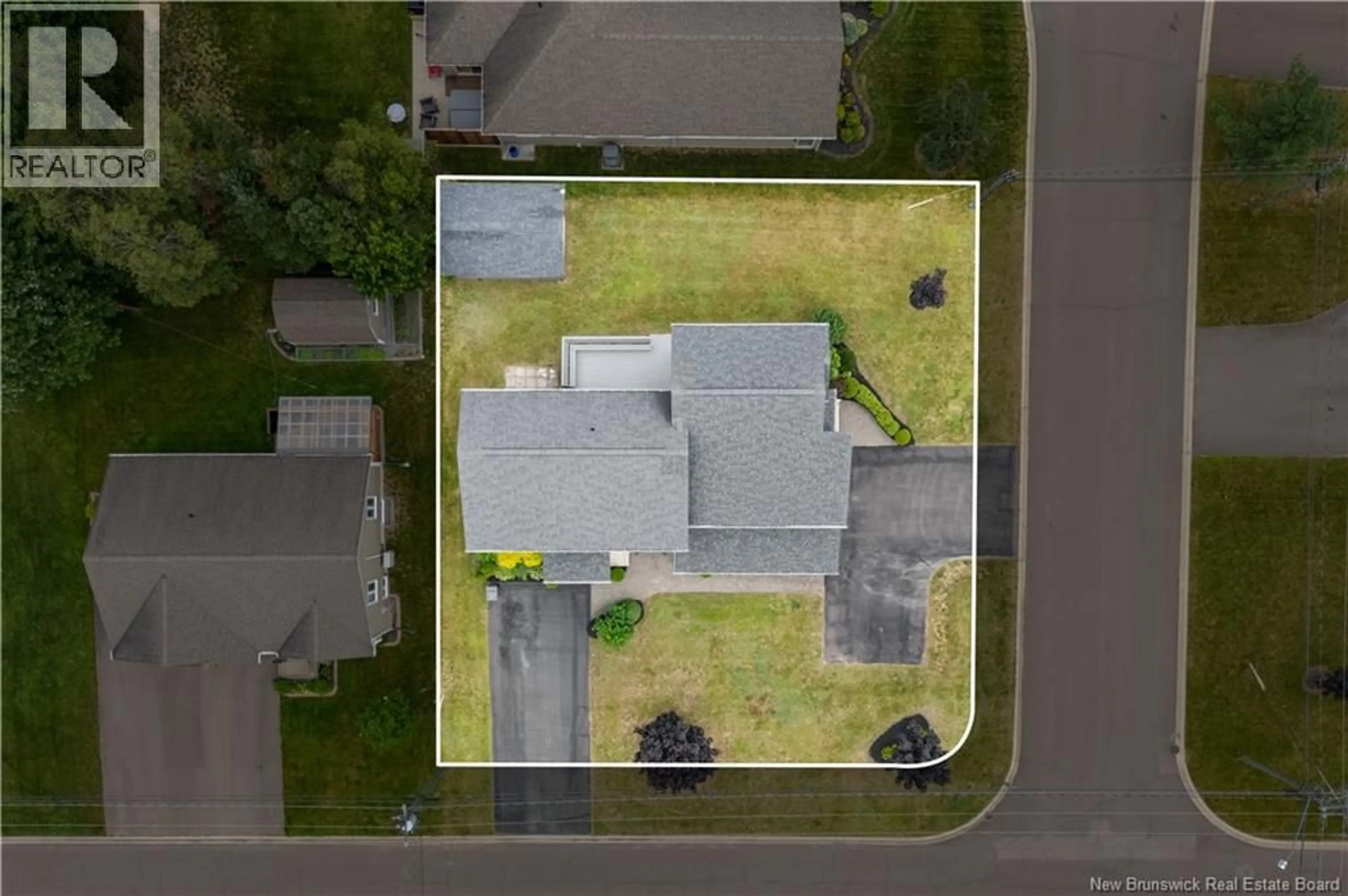 A pic from outside/outdoor area/front of a property/back of a property/a pic from drone, street for 10 YVES COURT, Dieppe New Brunswick E1A0Z7