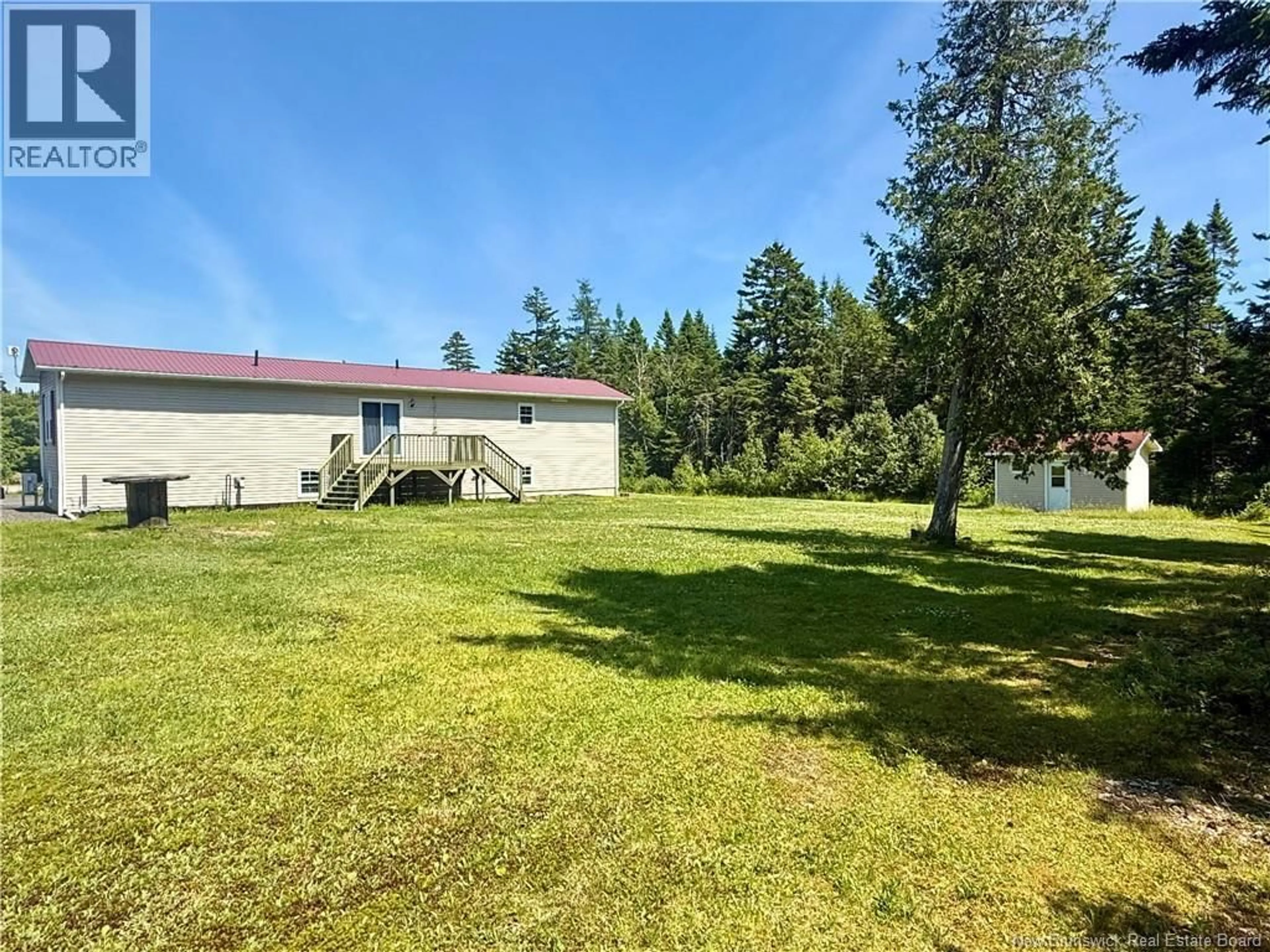 A pic from outside/outdoor area/front of a property/back of a property/a pic from drone, forest/trees view for 261 ROUTE 172, Letang New Brunswick E5C1W3