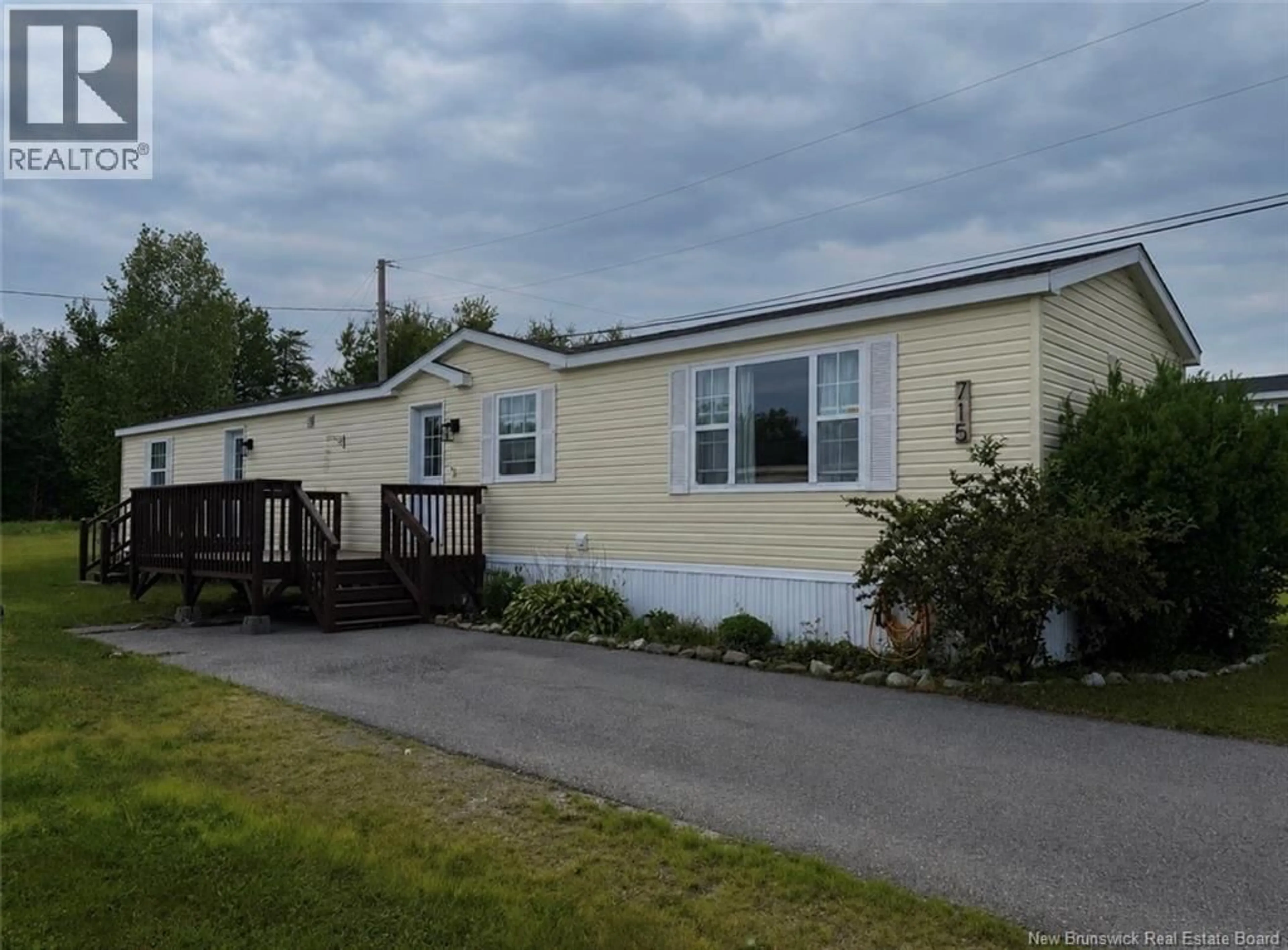 Home with vinyl exterior material, street for 715 WILLISTON DRIVE, Miramichi New Brunswick E1V5Z1