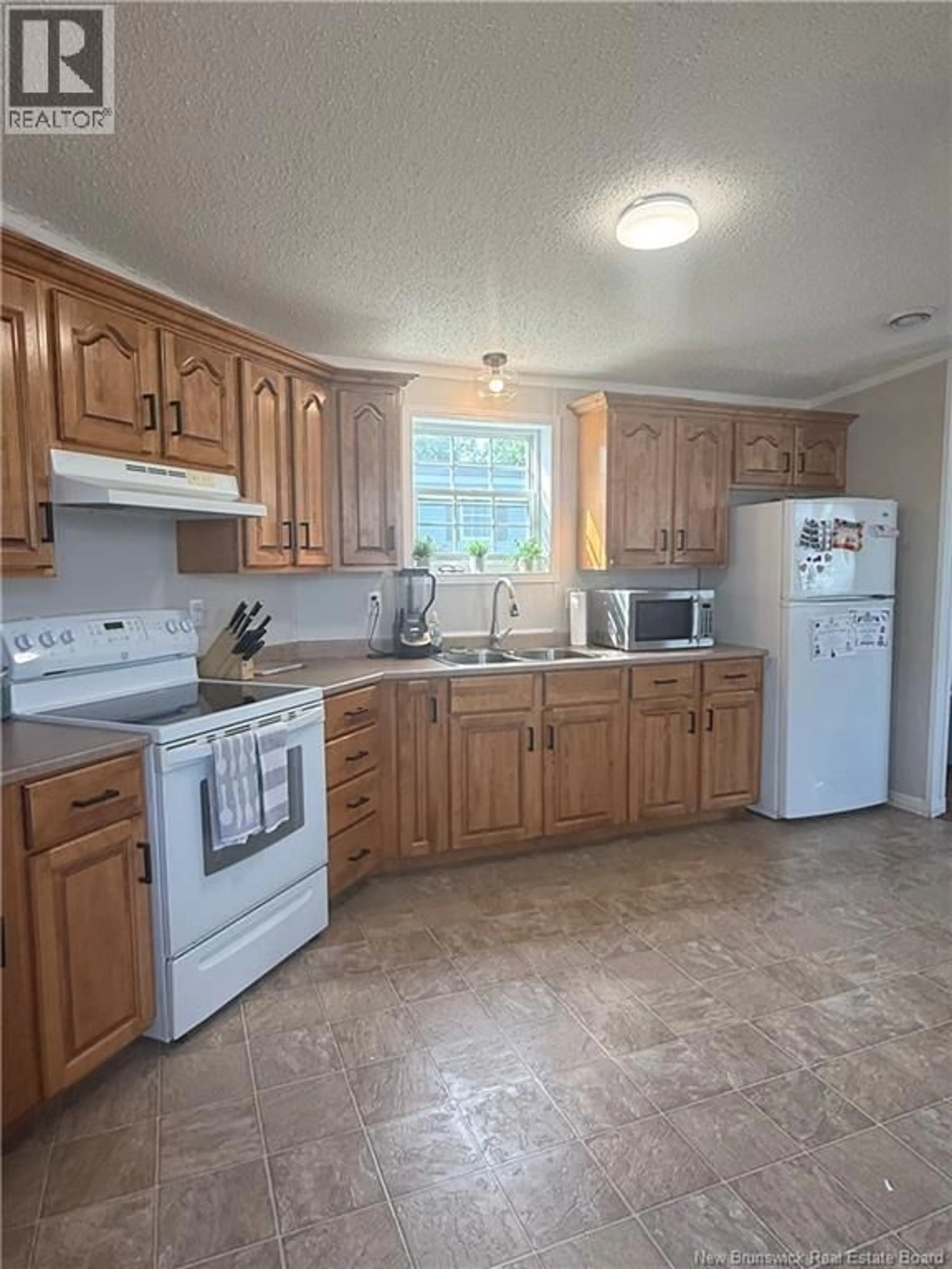 Standard kitchen, ceramic/tile floor for 715 WILLISTON DRIVE, Miramichi New Brunswick E1V5Z1