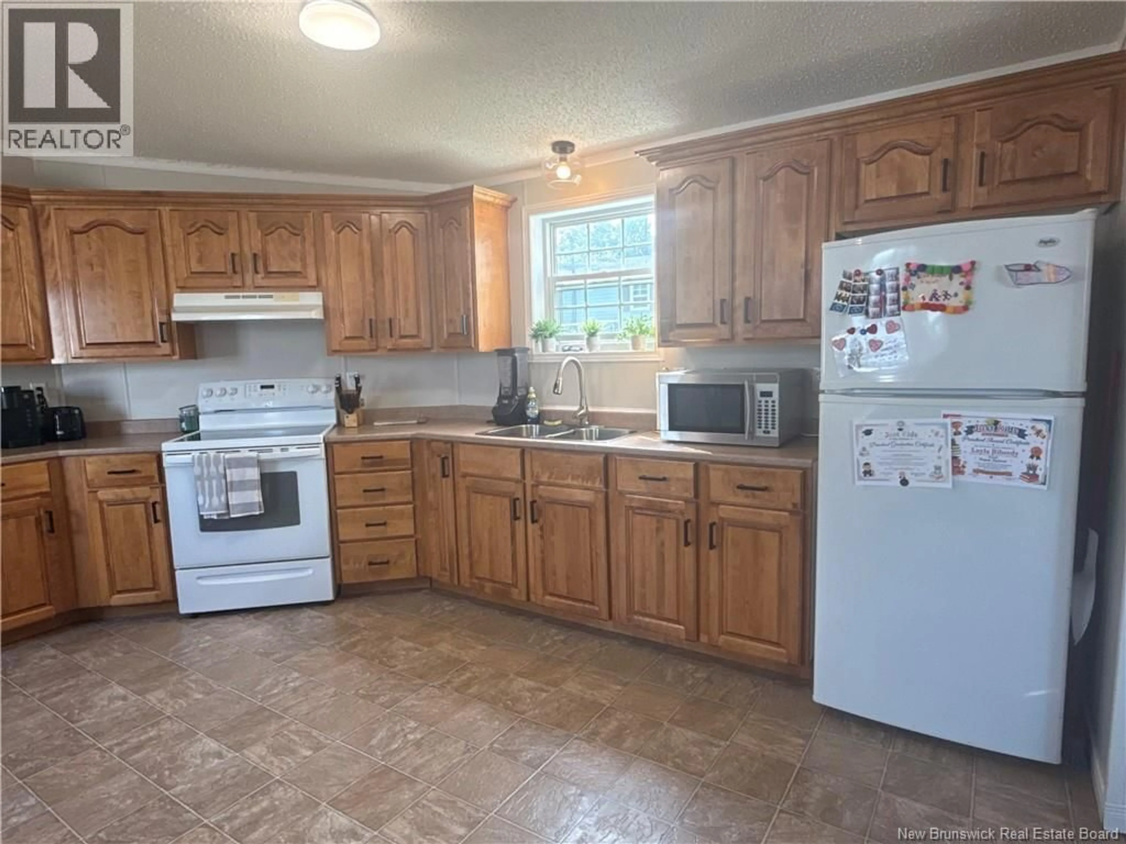 Standard kitchen, ceramic/tile floor for 715 WILLISTON DRIVE, Miramichi New Brunswick E1V5Z1