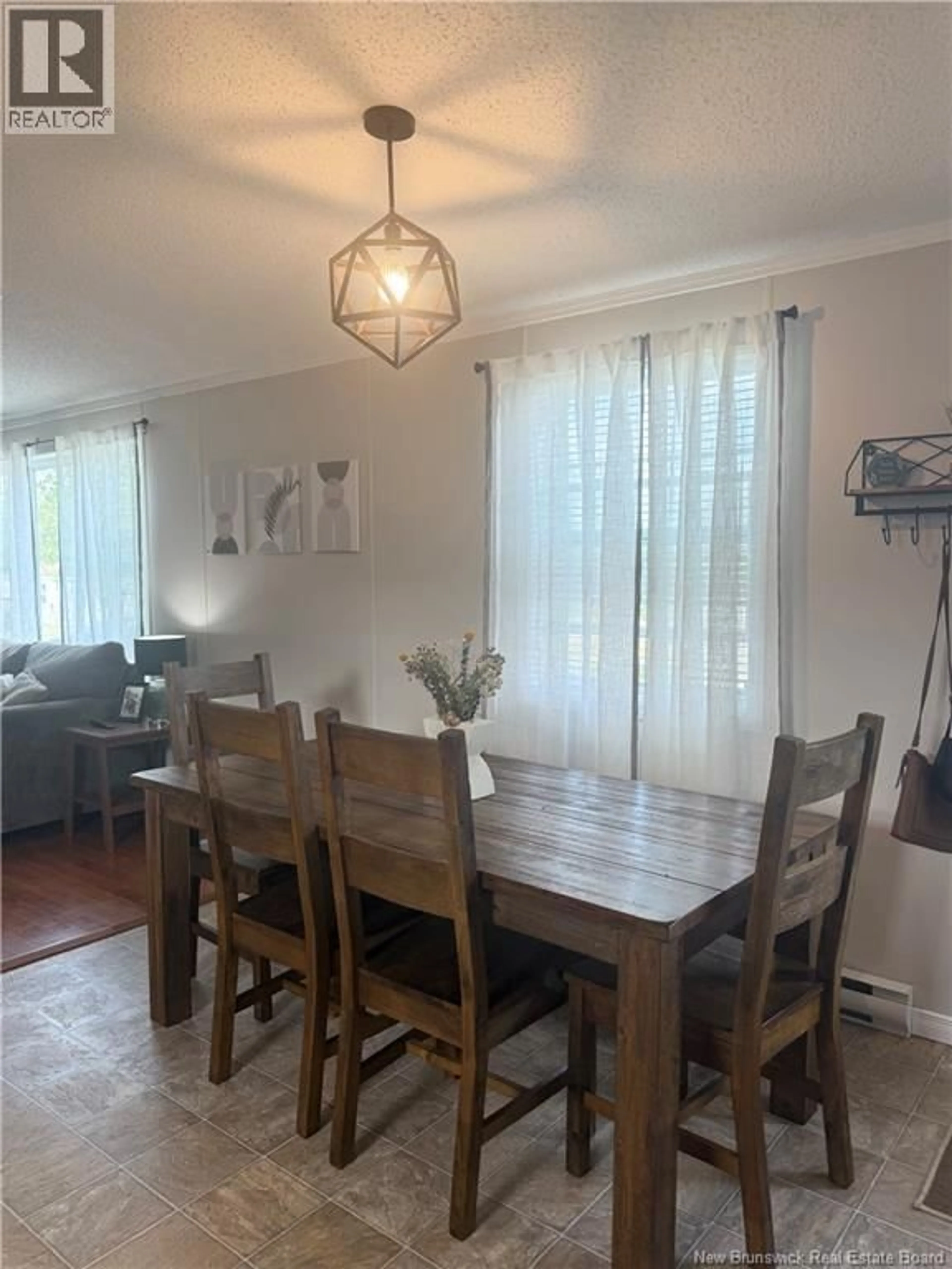 Dining room, wood/laminate floor for 715 WILLISTON DRIVE, Miramichi New Brunswick E1V5Z1