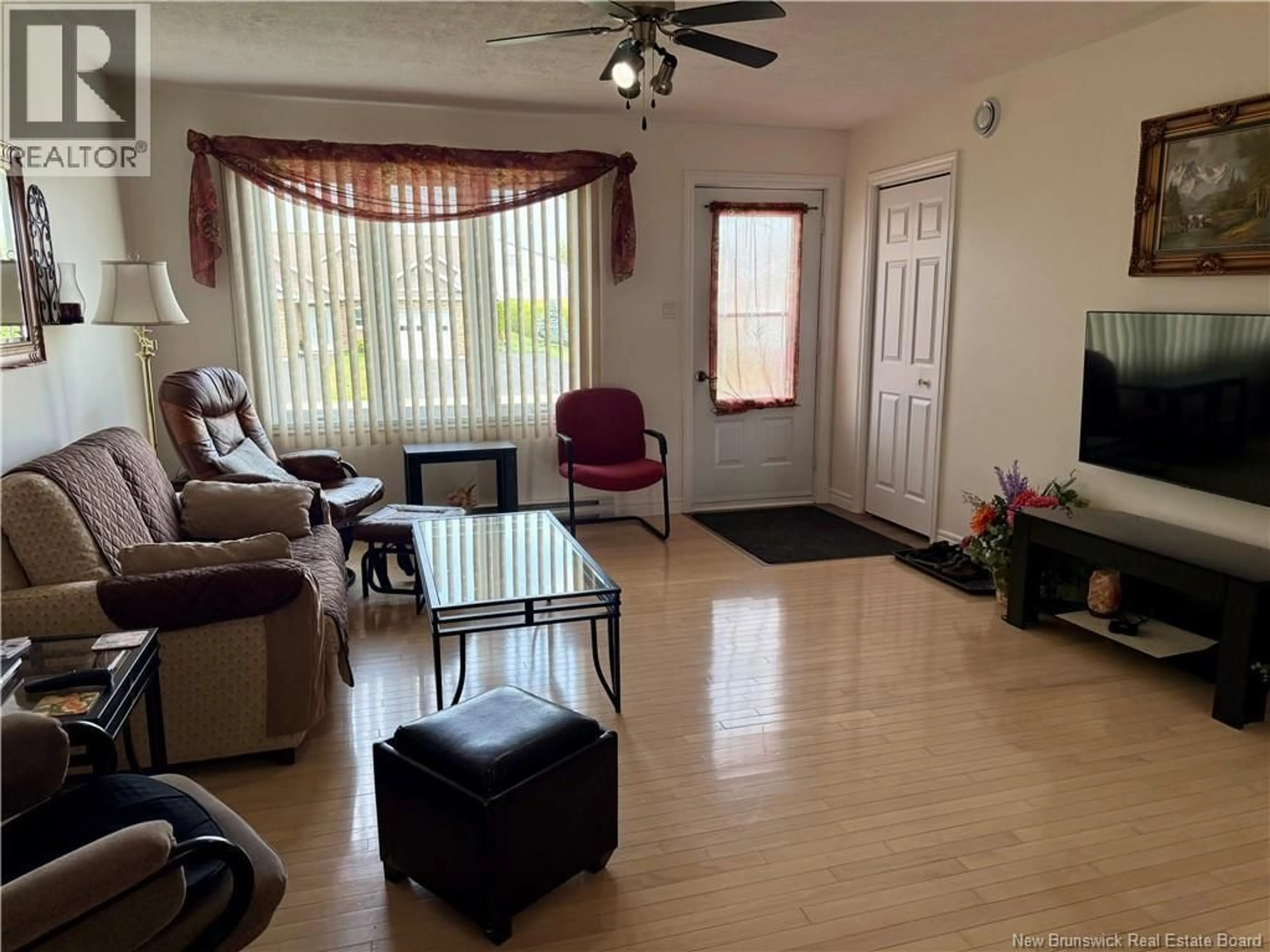Living room with furniture, wood/laminate floor for 333 MCCORMICK STREET, Grand-Sault/Grand Falls New Brunswick E3Y3X8