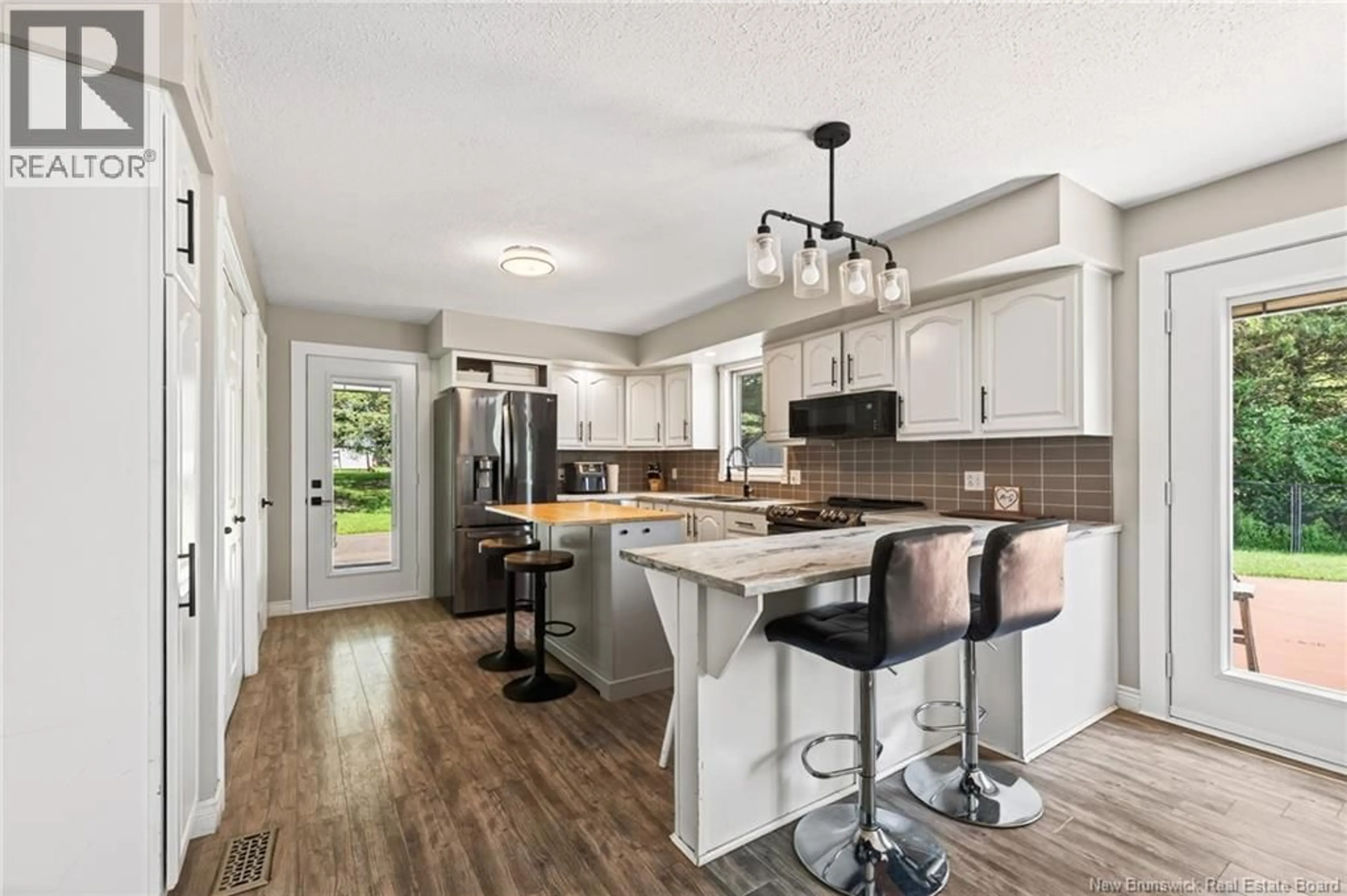 Open concept kitchen, ceramic/tile floor for 853 MELANSON ROAD, Dieppe New Brunswick E1A7N8