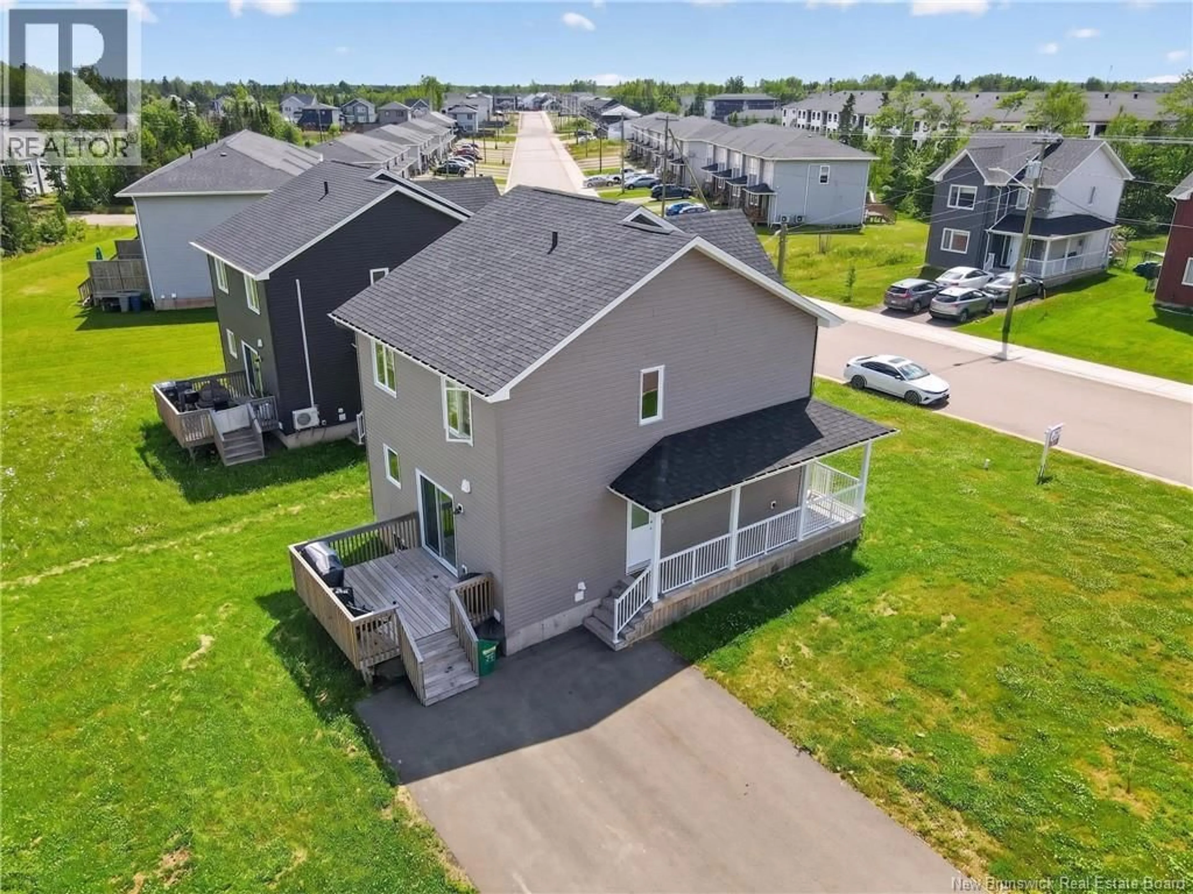 A pic from outside/outdoor area/front of a property/back of a property/a pic from drone, street for 218 FALCON DRIVE, Moncton New Brunswick E1H0H8