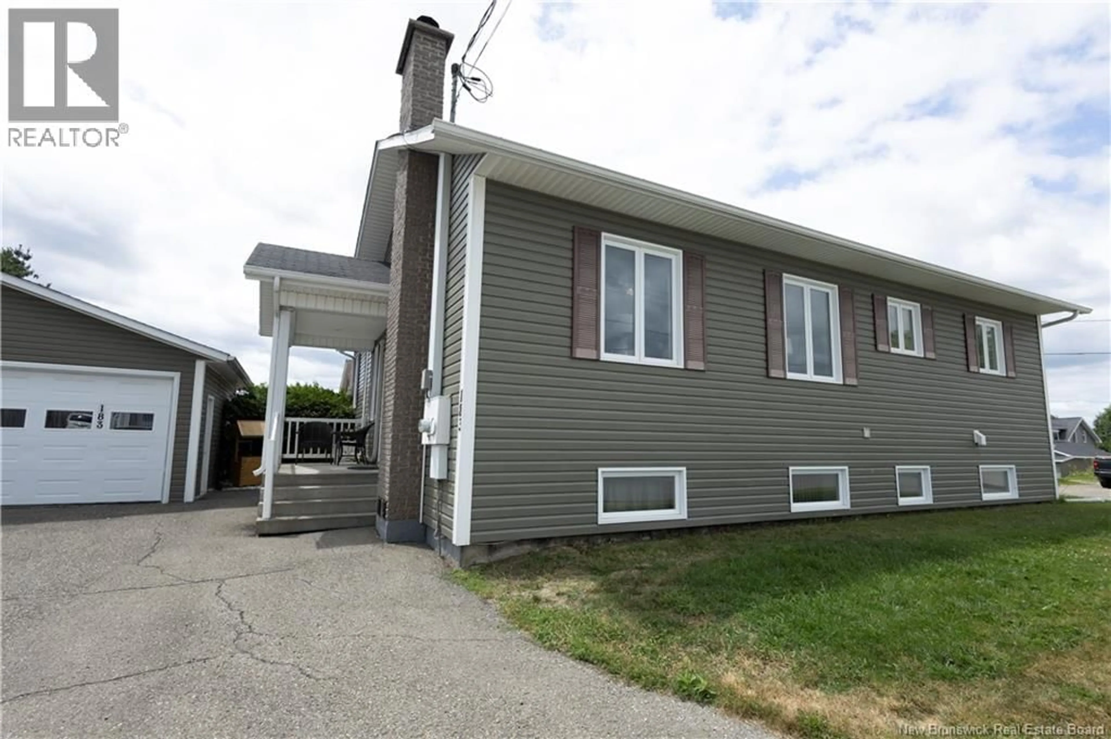 Home with vinyl exterior material, street for 183 ST. GEORGES STREET, Grand-Sault/Grand Falls New Brunswick E3Y1C3