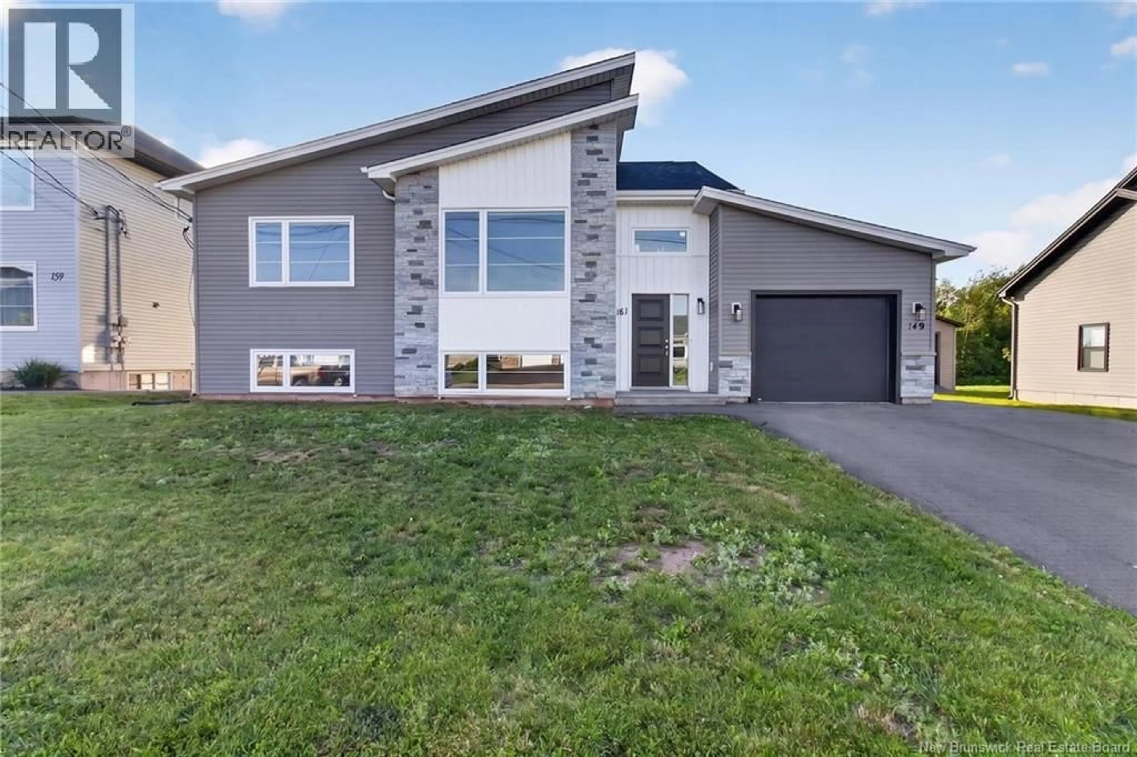 Home with vinyl exterior material, street for 151 O'NEILL STREET, Moncton New Brunswick E1A9R9