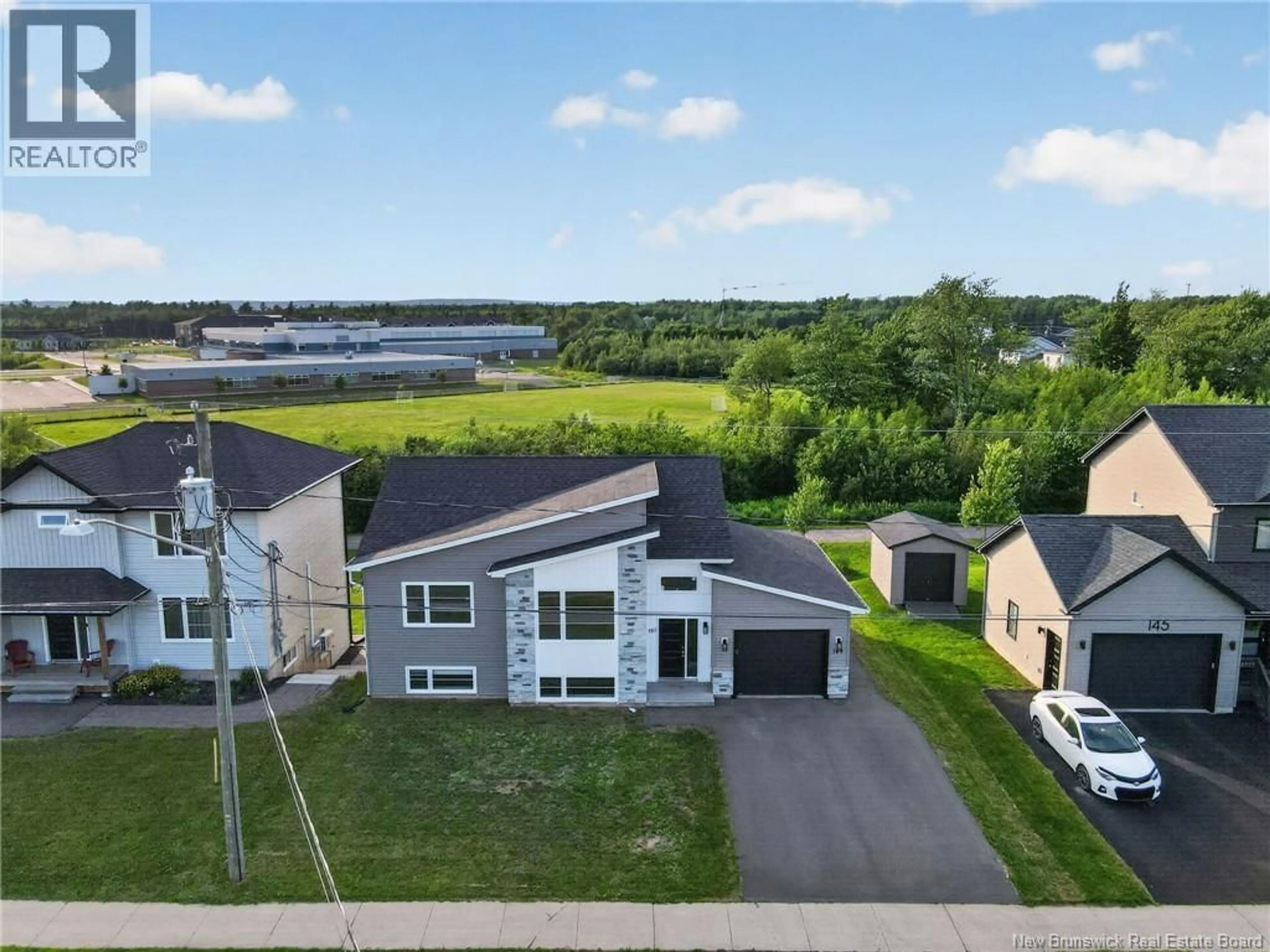 A pic from outside/outdoor area/front of a property/back of a property/a pic from drone, water/lake/river/ocean view for 151 O'NEILL STREET, Moncton New Brunswick E1A9R9