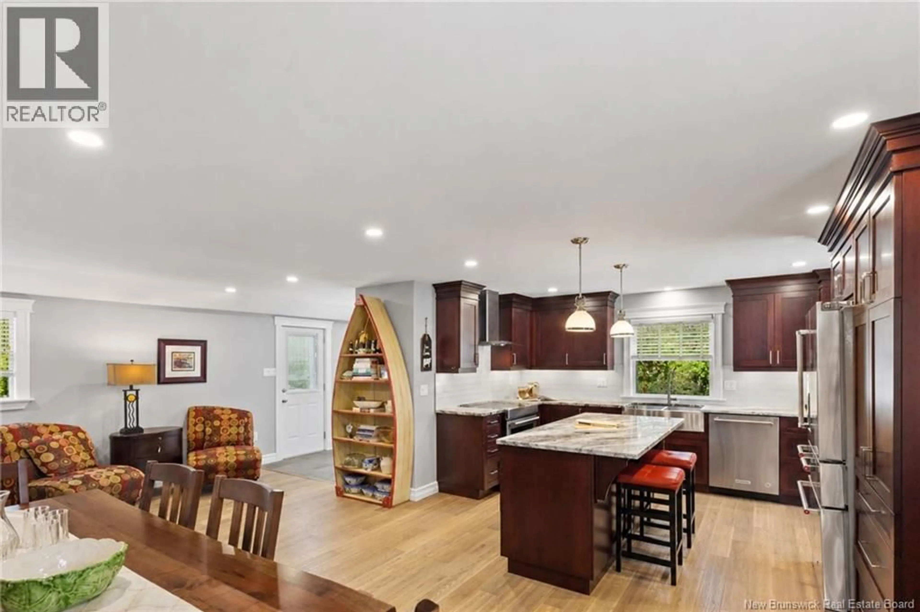 Open concept kitchen, wood/laminate floor for 2069 ROUTE 955, Little Shemogue New Brunswick E4M3K2