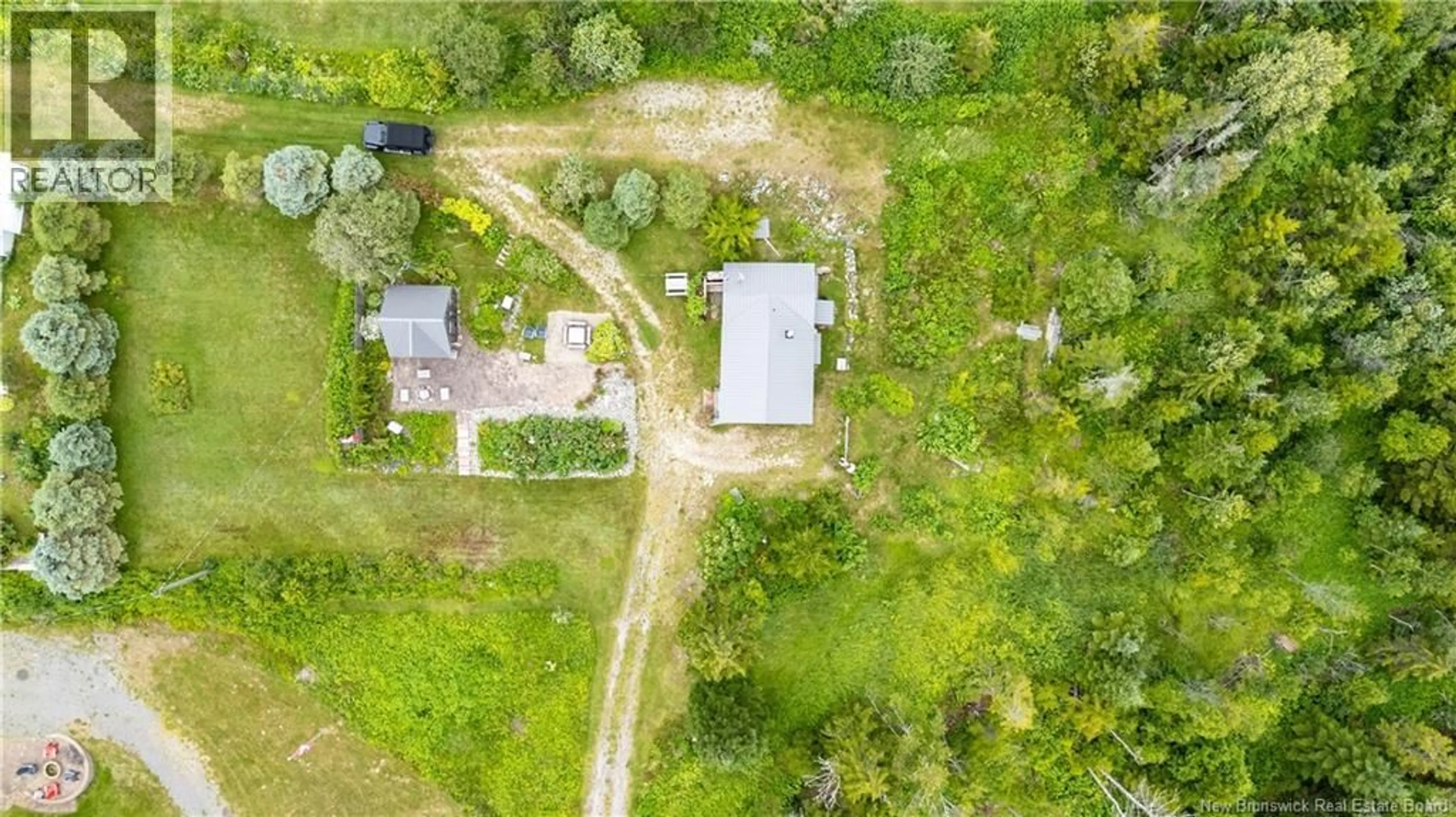 A pic from outside/outdoor area/front of a property/back of a property/a pic from drone, street for 100 SCHOOL STREET, Alma New Brunswick E4H1L1