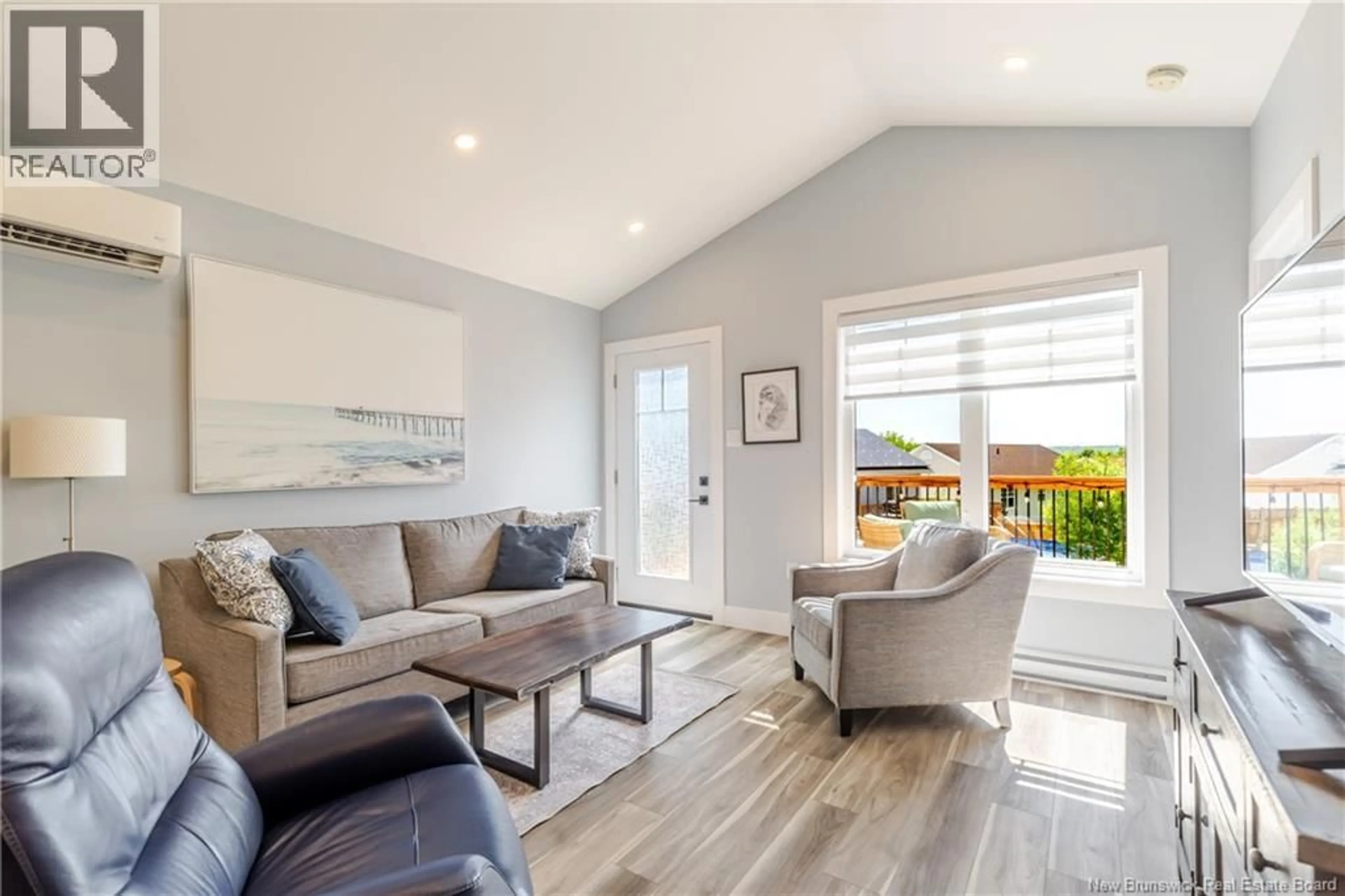 Living room with furniture, wood/laminate floor for 27 WYNGATE DRIVE, Fredericton New Brunswick E3A9X8