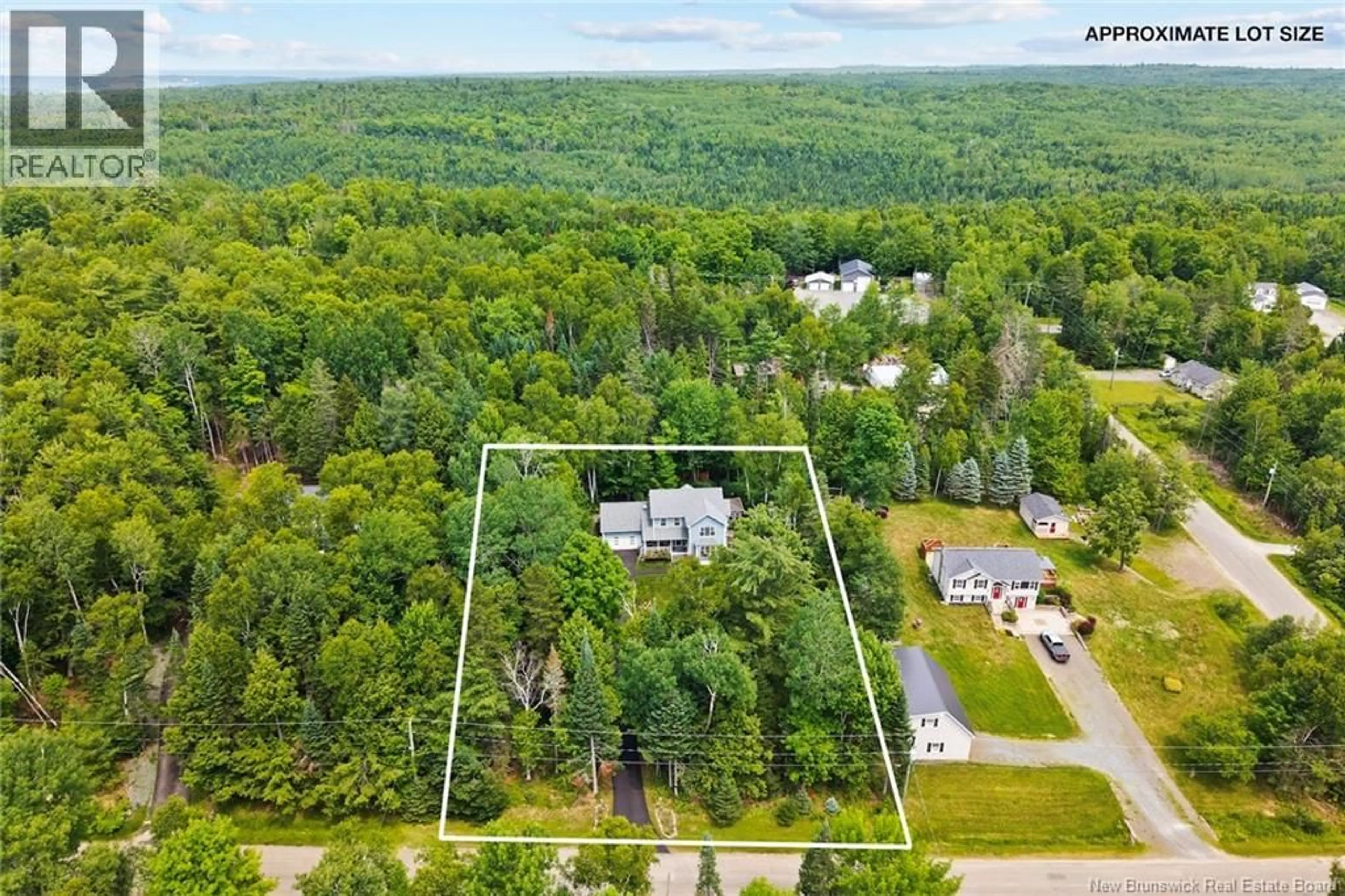 A pic from outside/outdoor area/front of a property/back of a property/a pic from drone, forest/trees view for 4 CHRISTOPHER CRESCENT, Upper Kingsclear New Brunswick E3E1T5