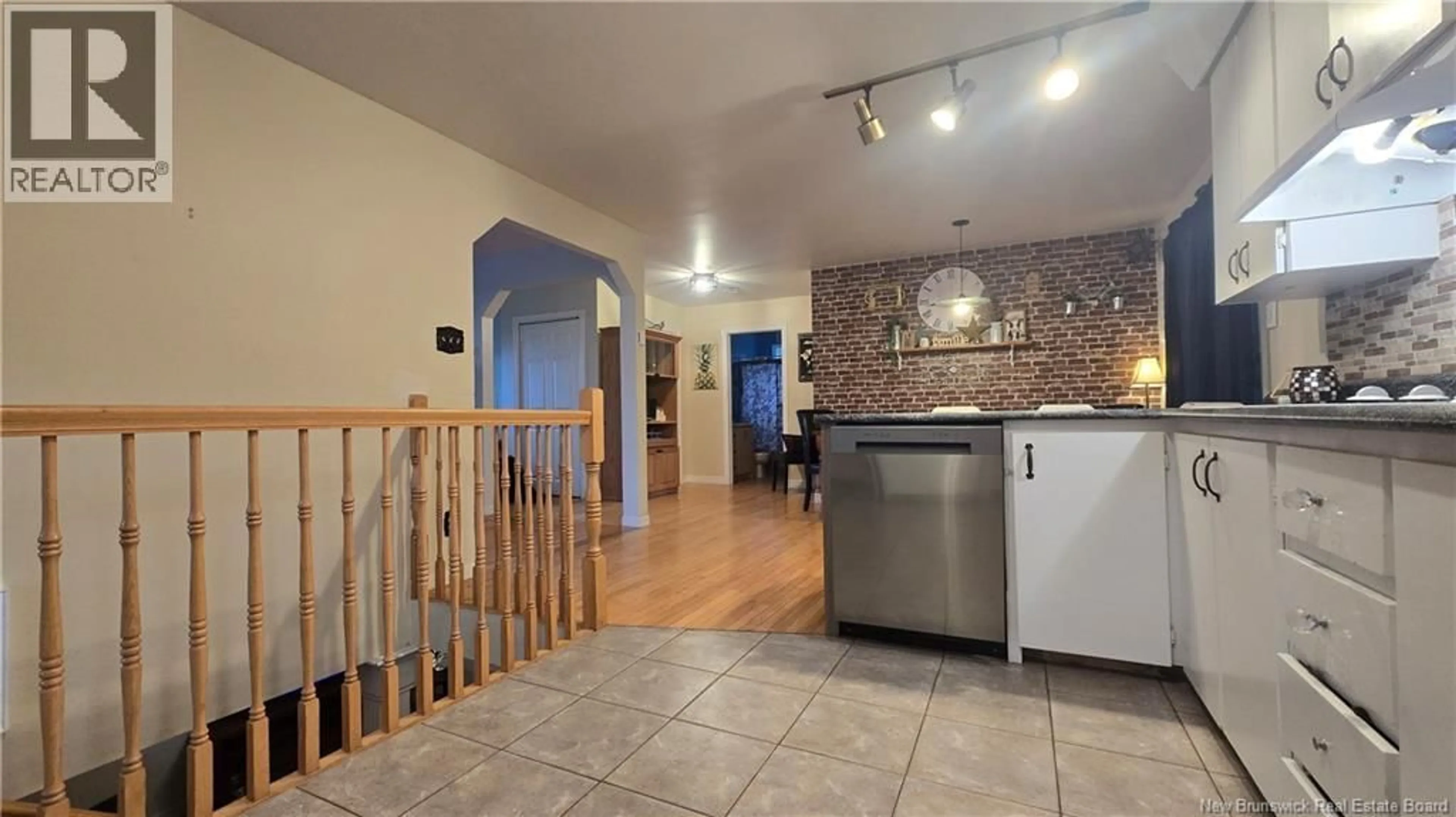 Open concept kitchen, ceramic/tile floor for 12 BÉLANGER STREET, Saint-Arthur New Brunswick E3N5P1