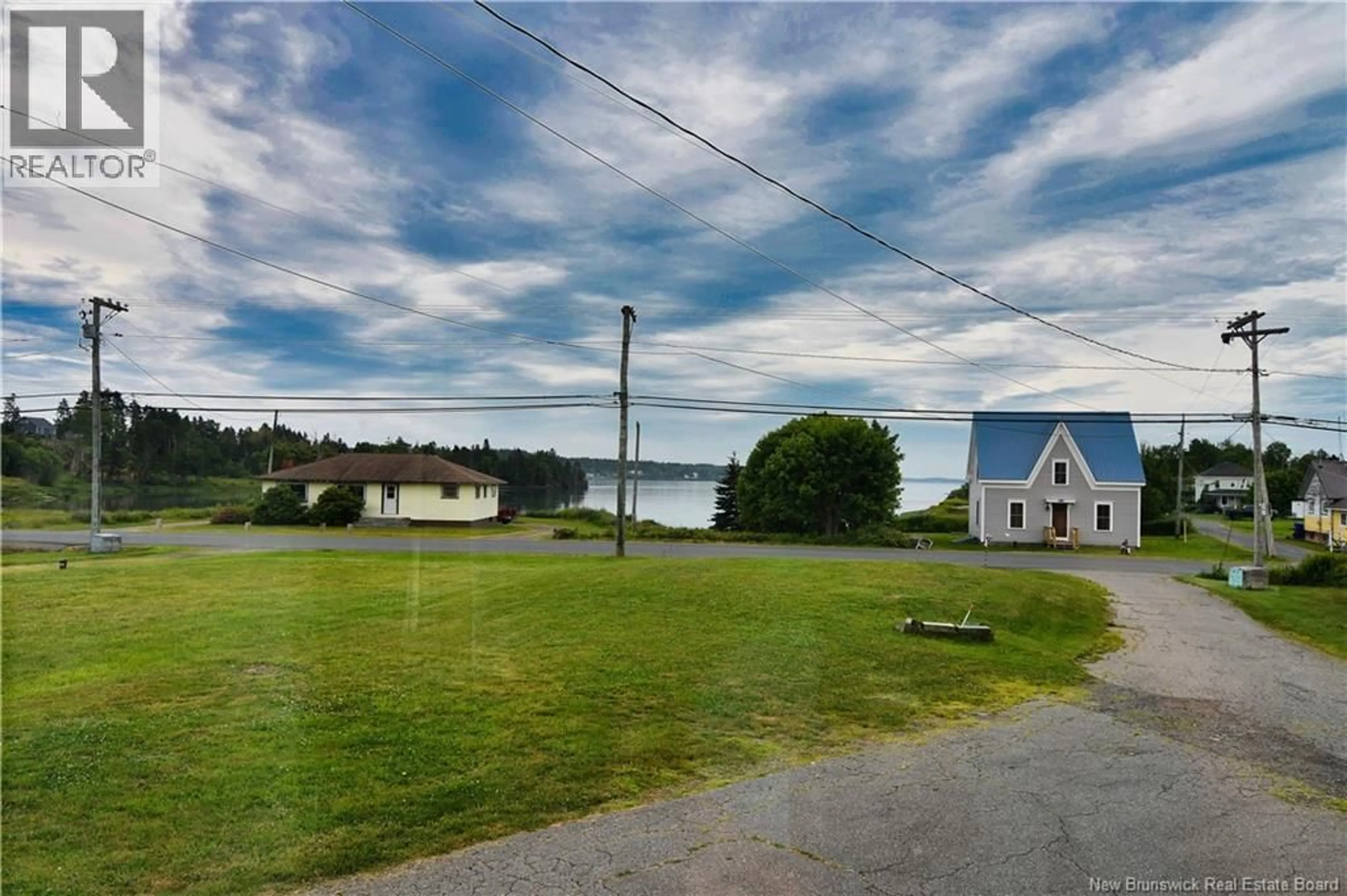 A pic from outside/outdoor area/front of a property/back of a property/a pic from drone, water/lake/river/ocean view for 2266 ROUTE 774, Wilsons Beach New Brunswick E5E1L4