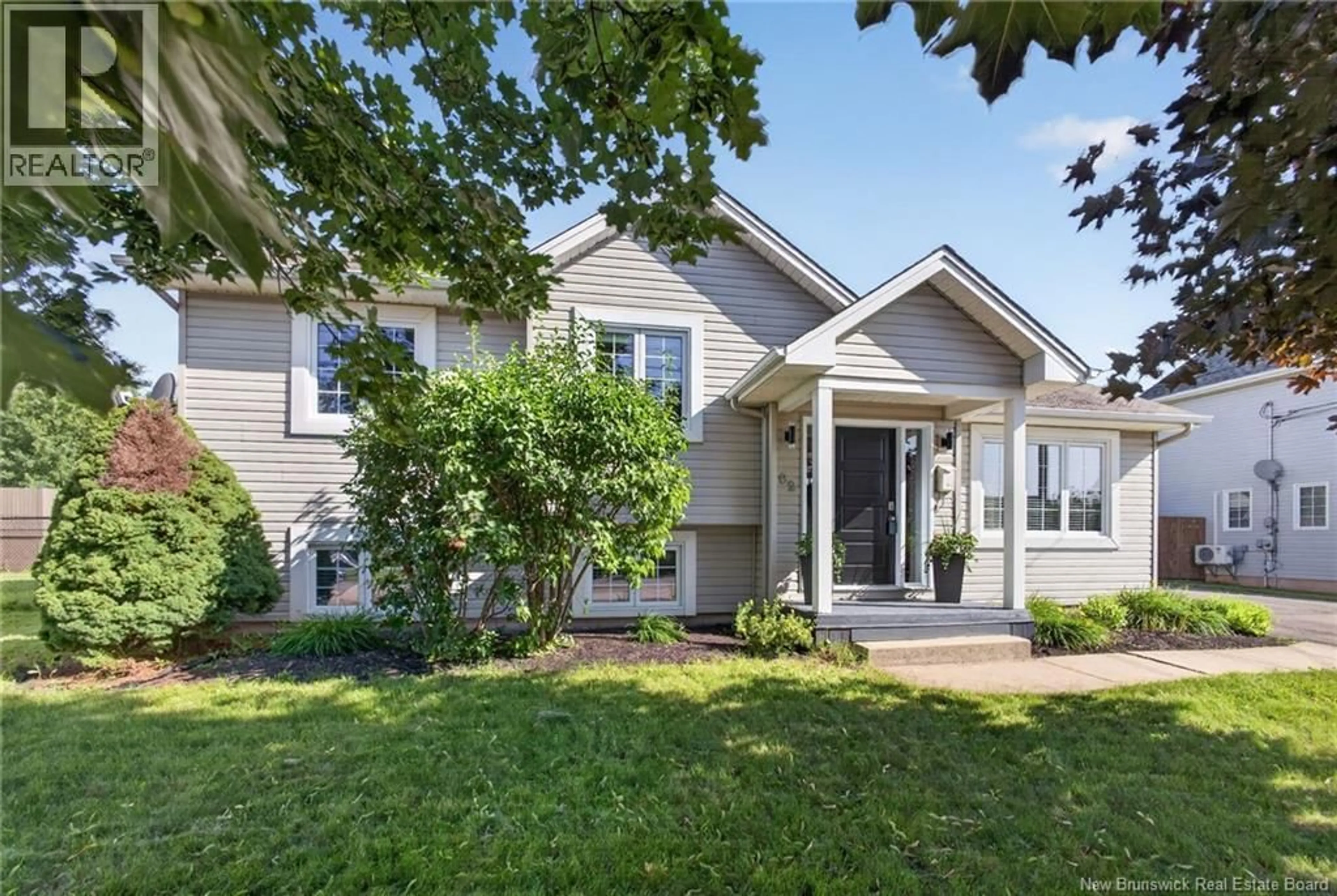 Home with vinyl exterior material, street for 82 DES BOULEAUX CRESCENT, Dieppe New Brunswick E1A7X8