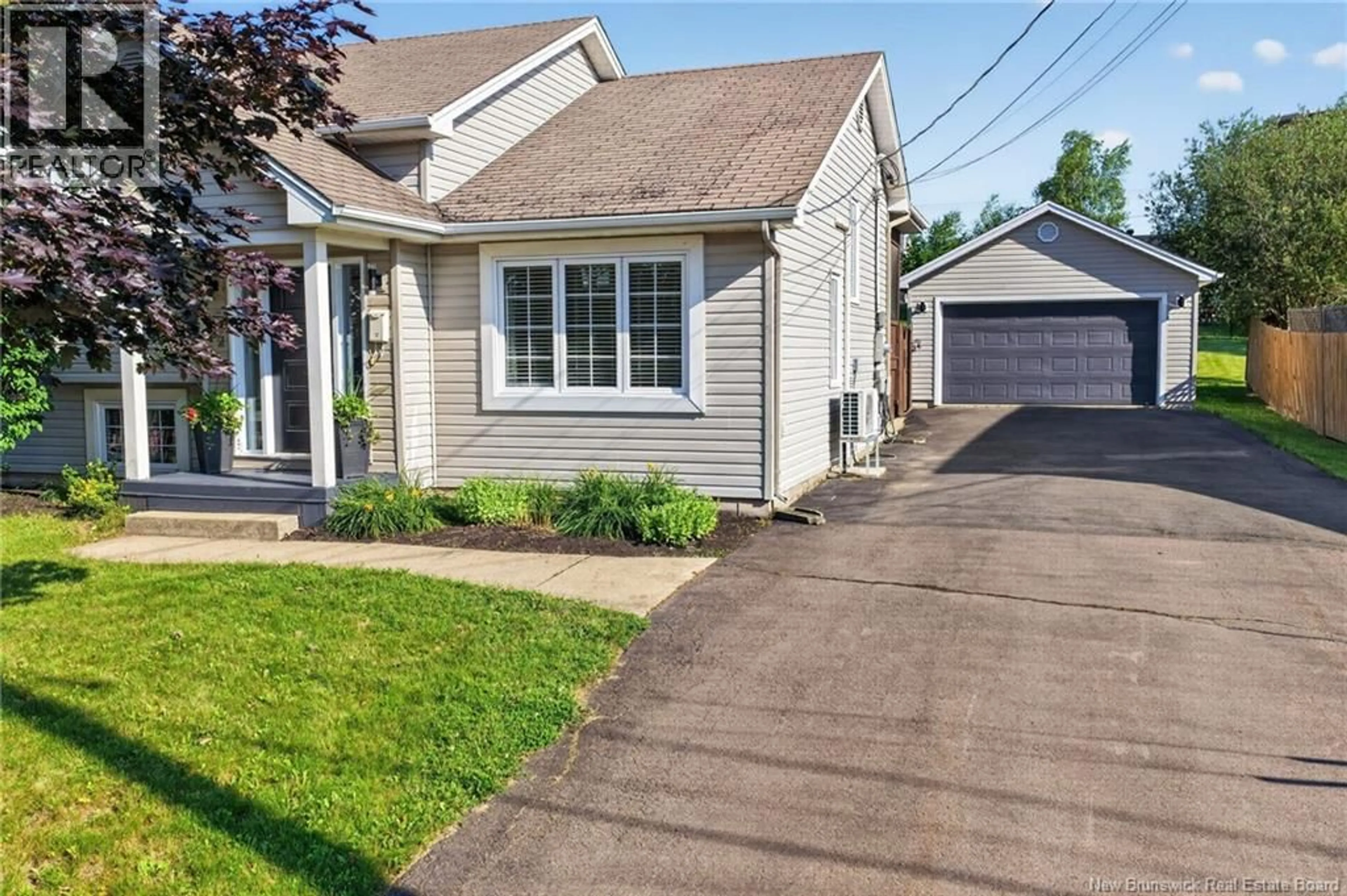 Home with vinyl exterior material, street for 82 DES BOULEAUX CRESCENT, Dieppe New Brunswick E1A7X8