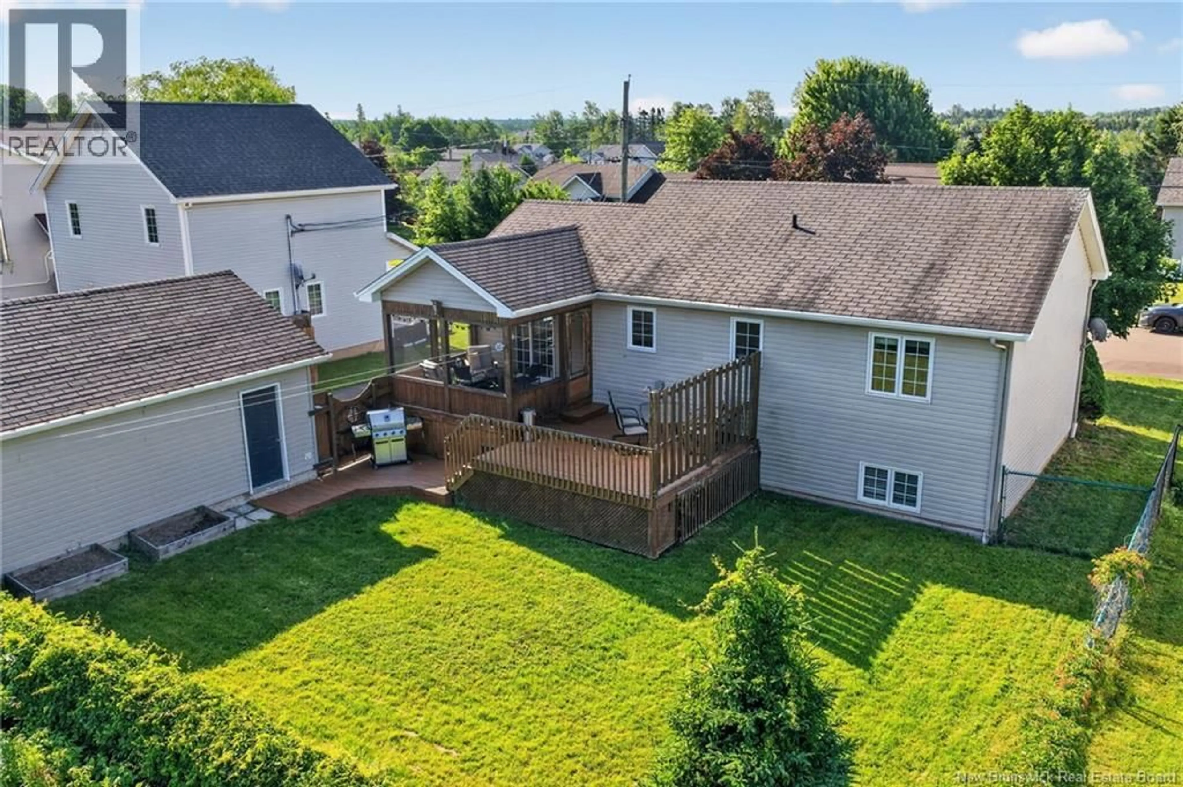 A pic from outside/outdoor area/front of a property/back of a property/a pic from drone, unknown for 82 DES BOULEAUX CRESCENT, Dieppe New Brunswick E1A7X8
