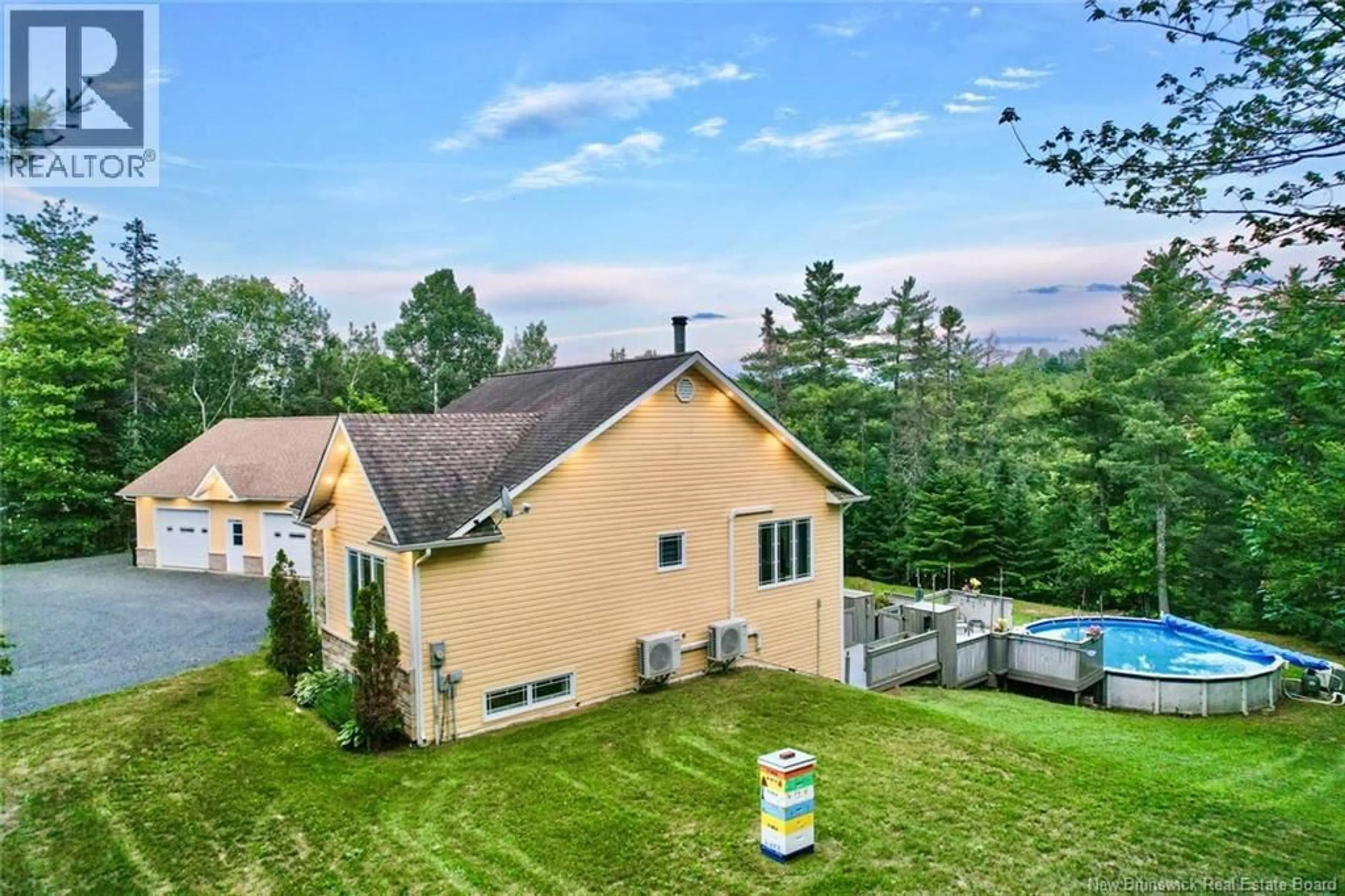 A pic from outside/outdoor area/front of a property/back of a property/a pic from drone, unknown for 8 MILTON BRAE, North Tetagouche New Brunswick E2A4Y8