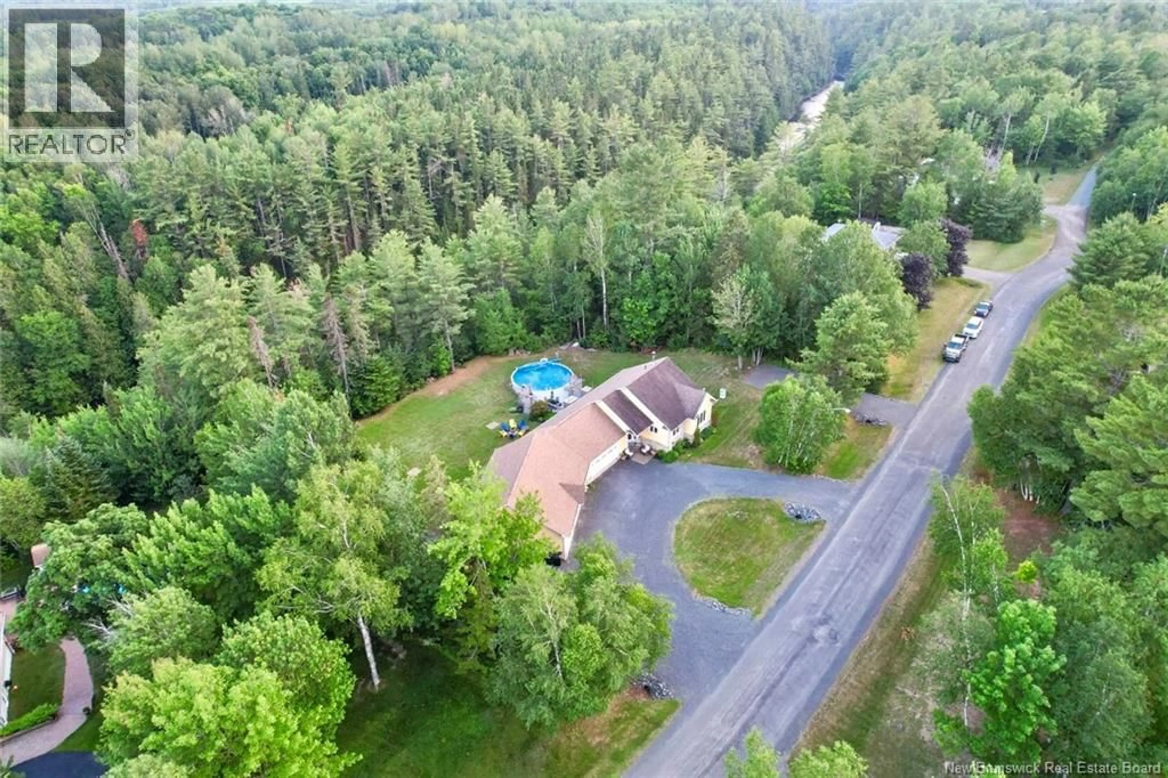A pic from outside/outdoor area/front of a property/back of a property/a pic from drone, forest/trees view for 8 MILTON BRAE, North Tetagouche New Brunswick E2A4Y8