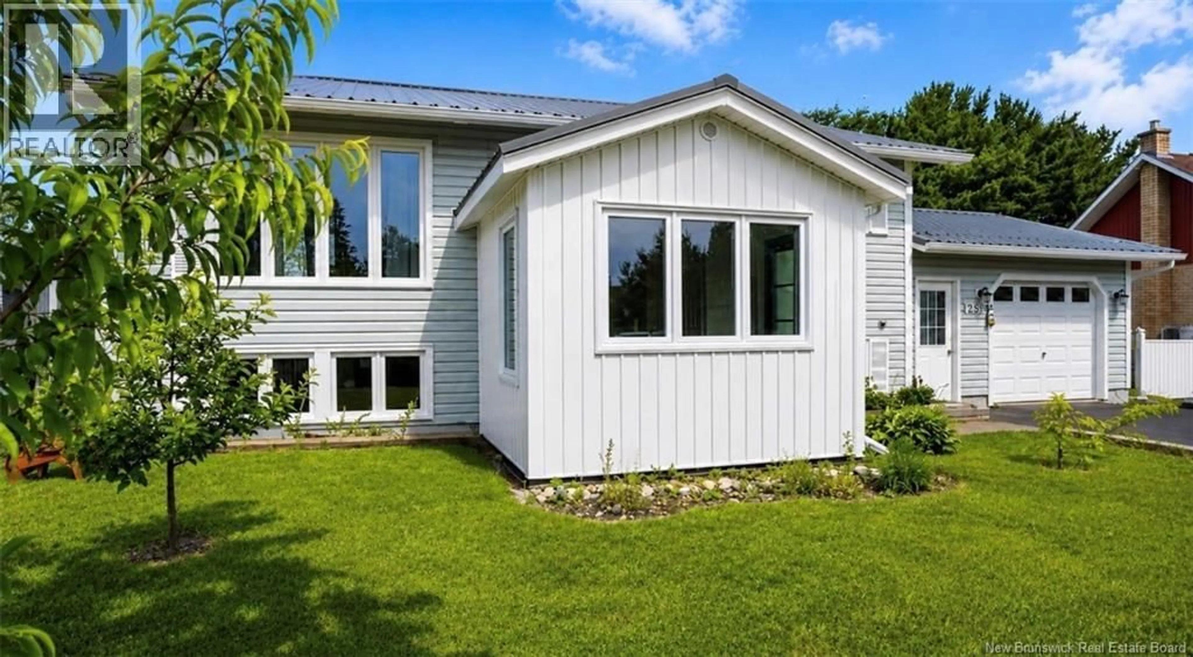 Home with vinyl exterior material, street for 1255 VENIOT AVENUE, Bathurst New Brunswick E2A4C1
