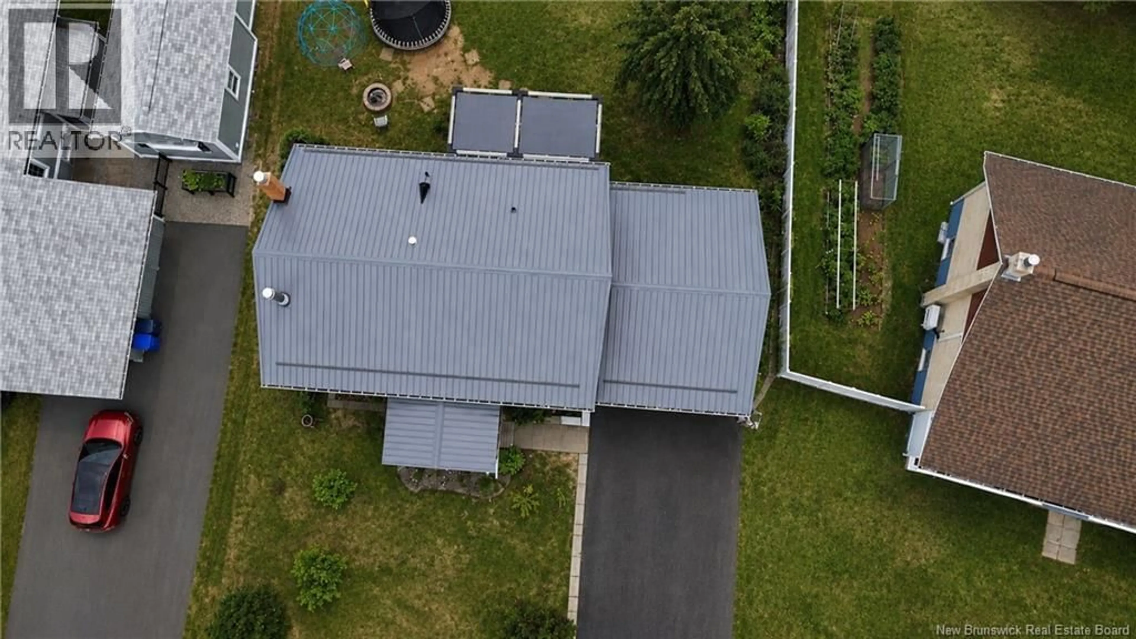 A pic from outside/outdoor area/front of a property/back of a property/a pic from drone, building for 1255 VENIOT AVENUE, Bathurst New Brunswick E2A4C1