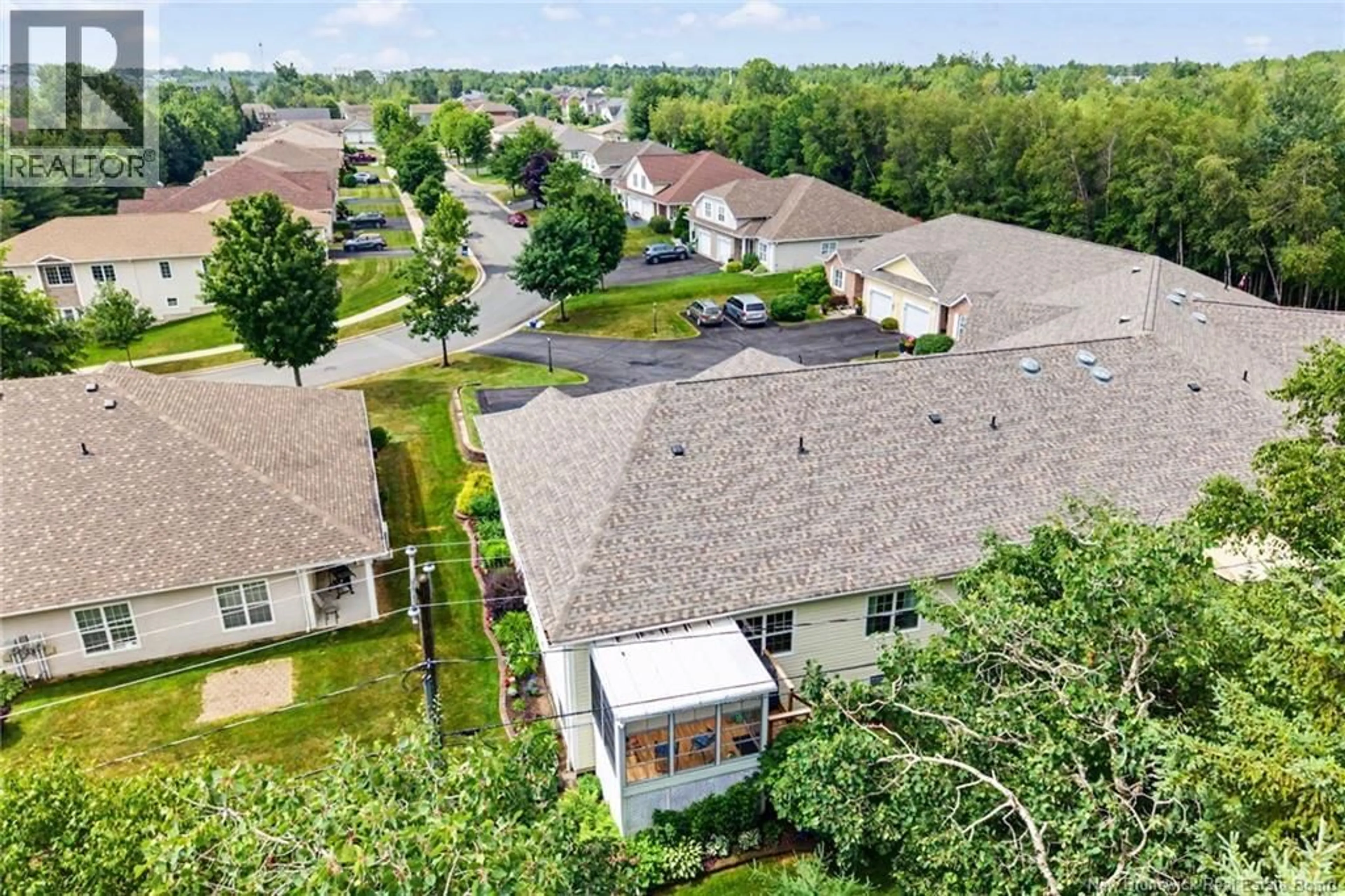 A pic from outside/outdoor area/front of a property/back of a property/a pic from drone, unknown for 6 - 28 SARAHS LANE, Fredericton New Brunswick E3B0G1