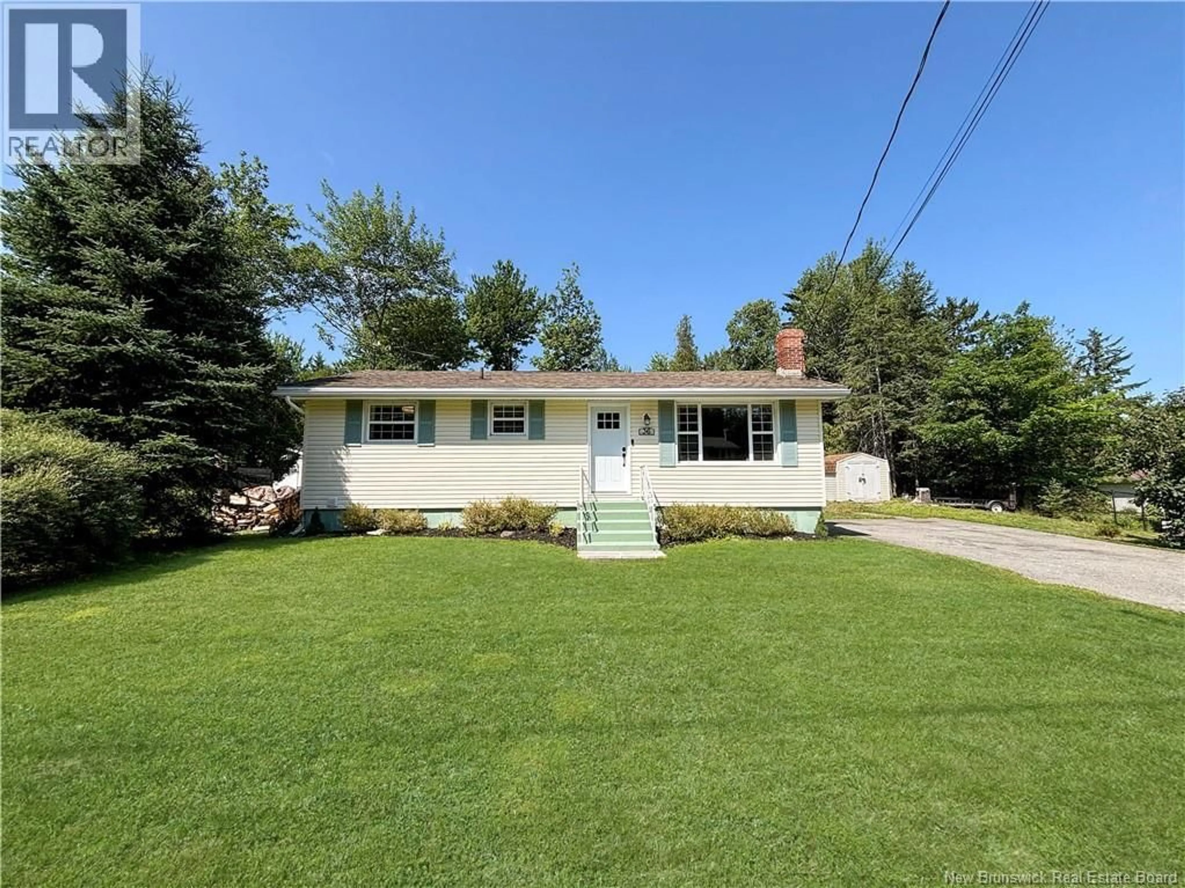 Home with vinyl exterior material, street for 36 CHAPEL ROAD, Rothesay New Brunswick E2E3M2