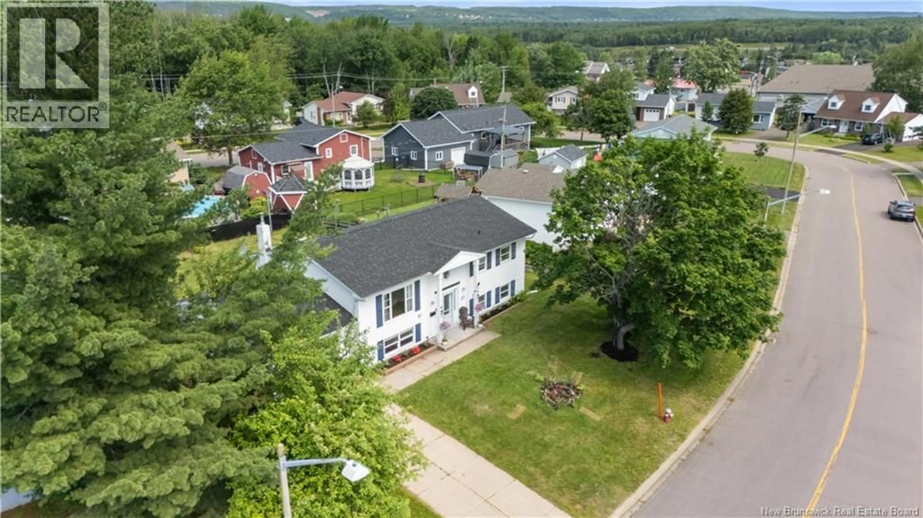 A pic from outside/outdoor area/front of a property/back of a property/a pic from drone, street for 97 ASHLEY CRESCENT, Moncton New Brunswick E1G1R5