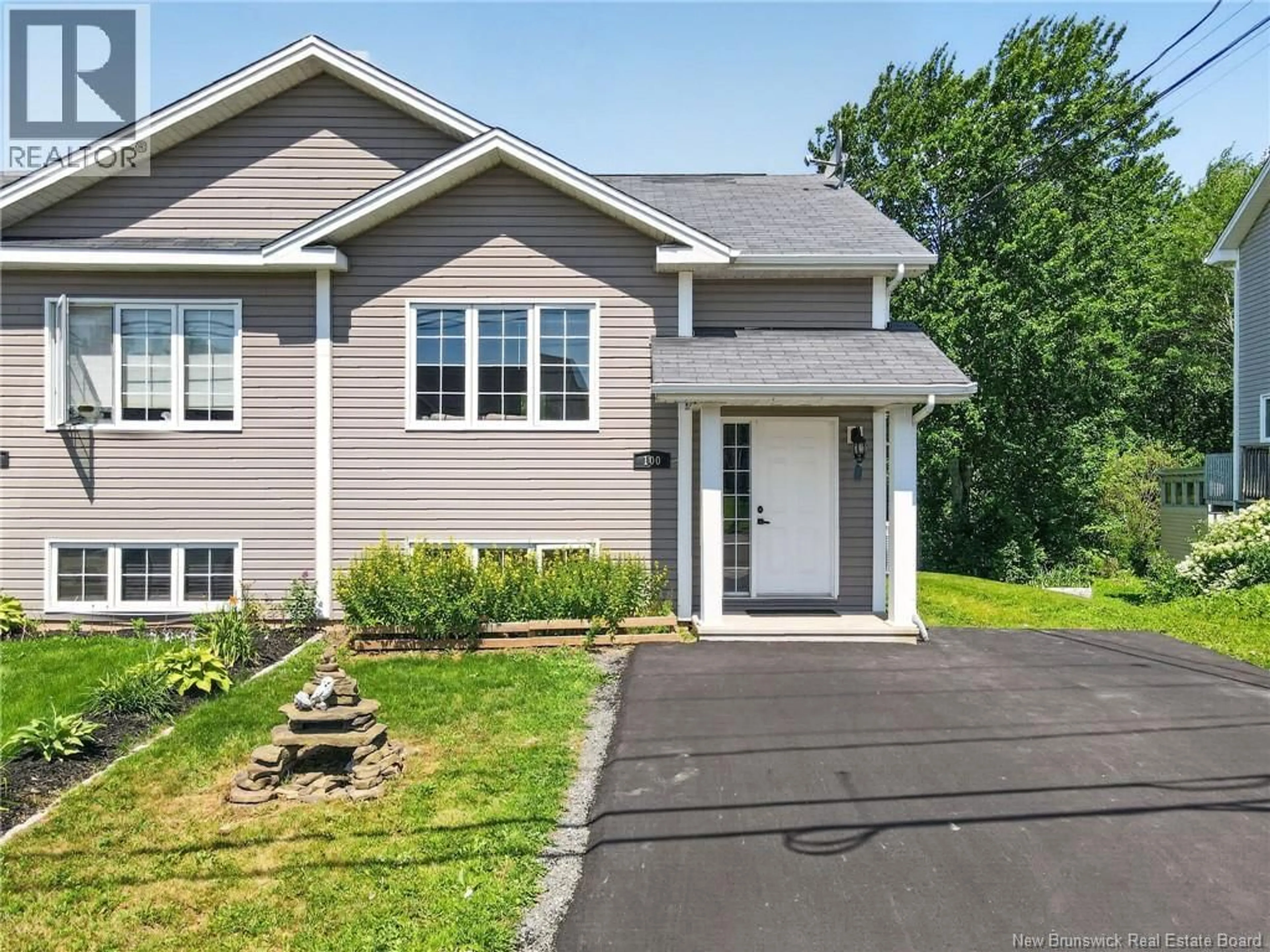 Home with vinyl exterior material, street for 100 BELLE FORET STREET, Dieppe New Brunswick E1A8X9