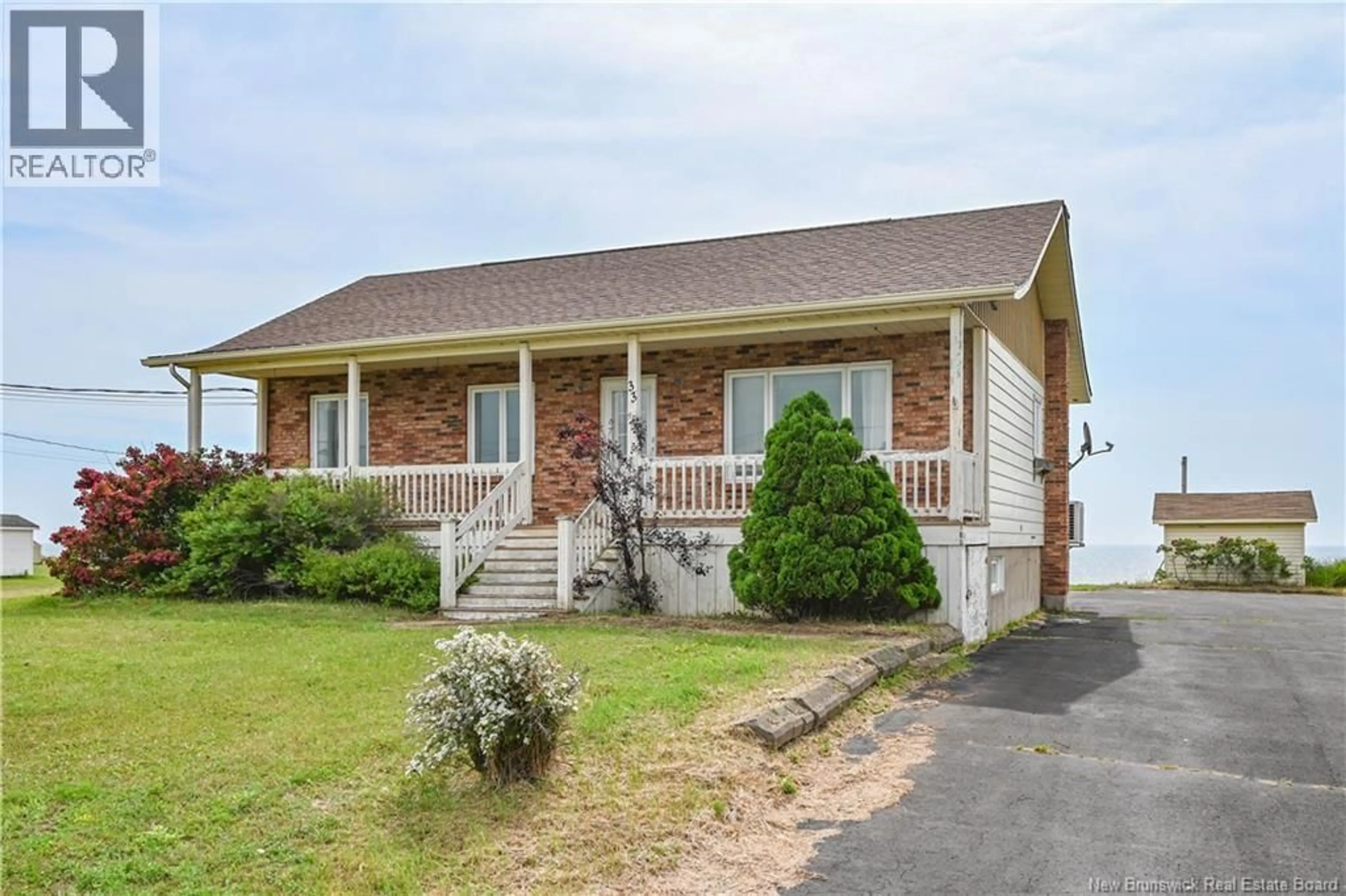 Home with brick exterior material, street for 33 PAULIN STREET, Saint-Marie-Saint-Raphaël New Brunswick E8T1T7