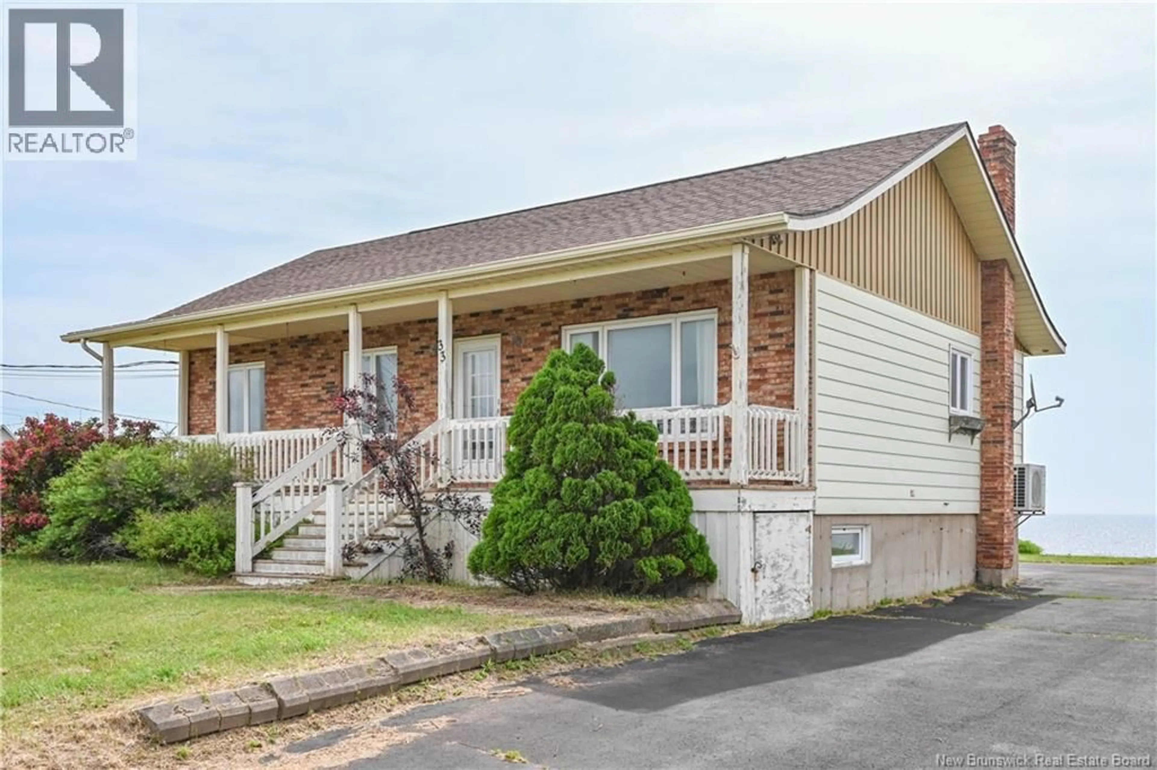 Home with vinyl exterior material, street for 33 PAULIN STREET, Saint-Marie-Saint-Raphaël New Brunswick E8T1T7