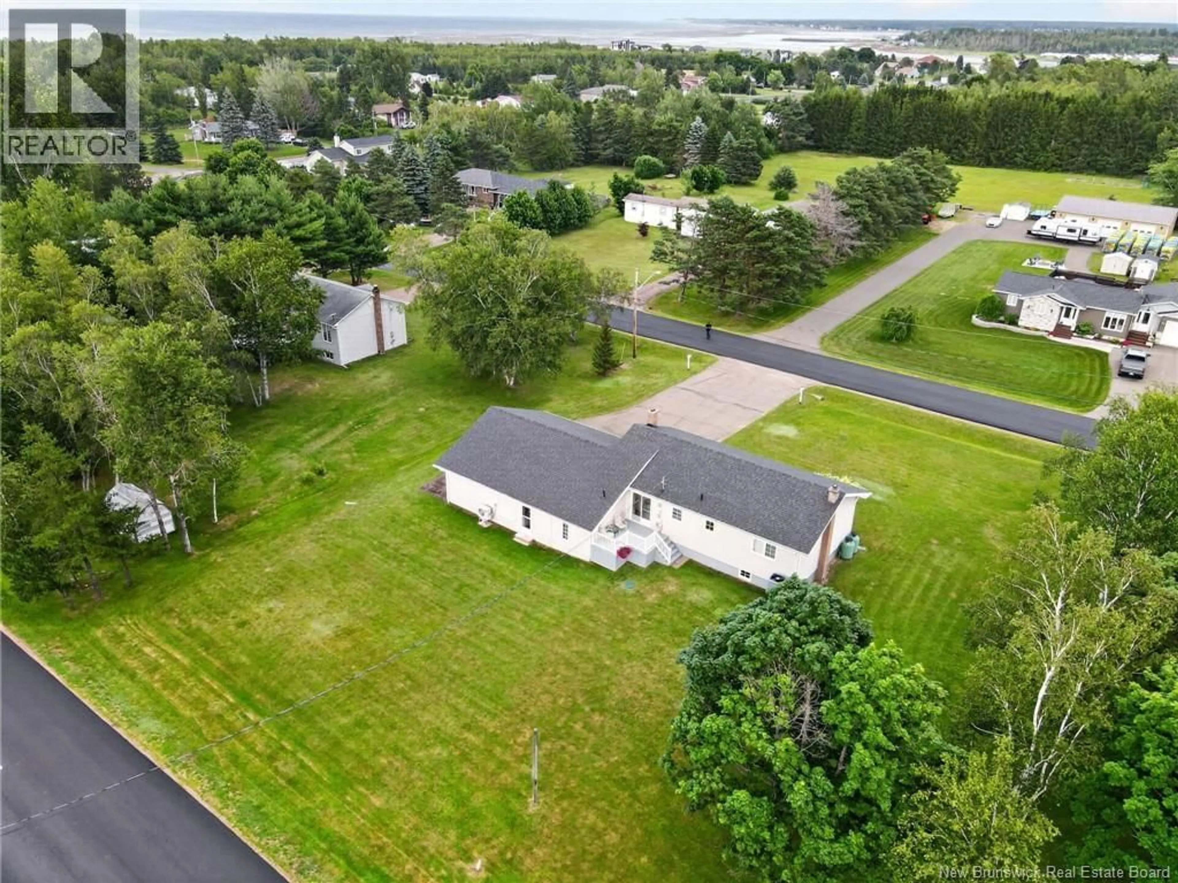 A pic from outside/outdoor area/front of a property/back of a property/a pic from drone, water/lake/river/ocean view for 6 PAUL STREET, Grand-Barachois New Brunswick E4P7V5