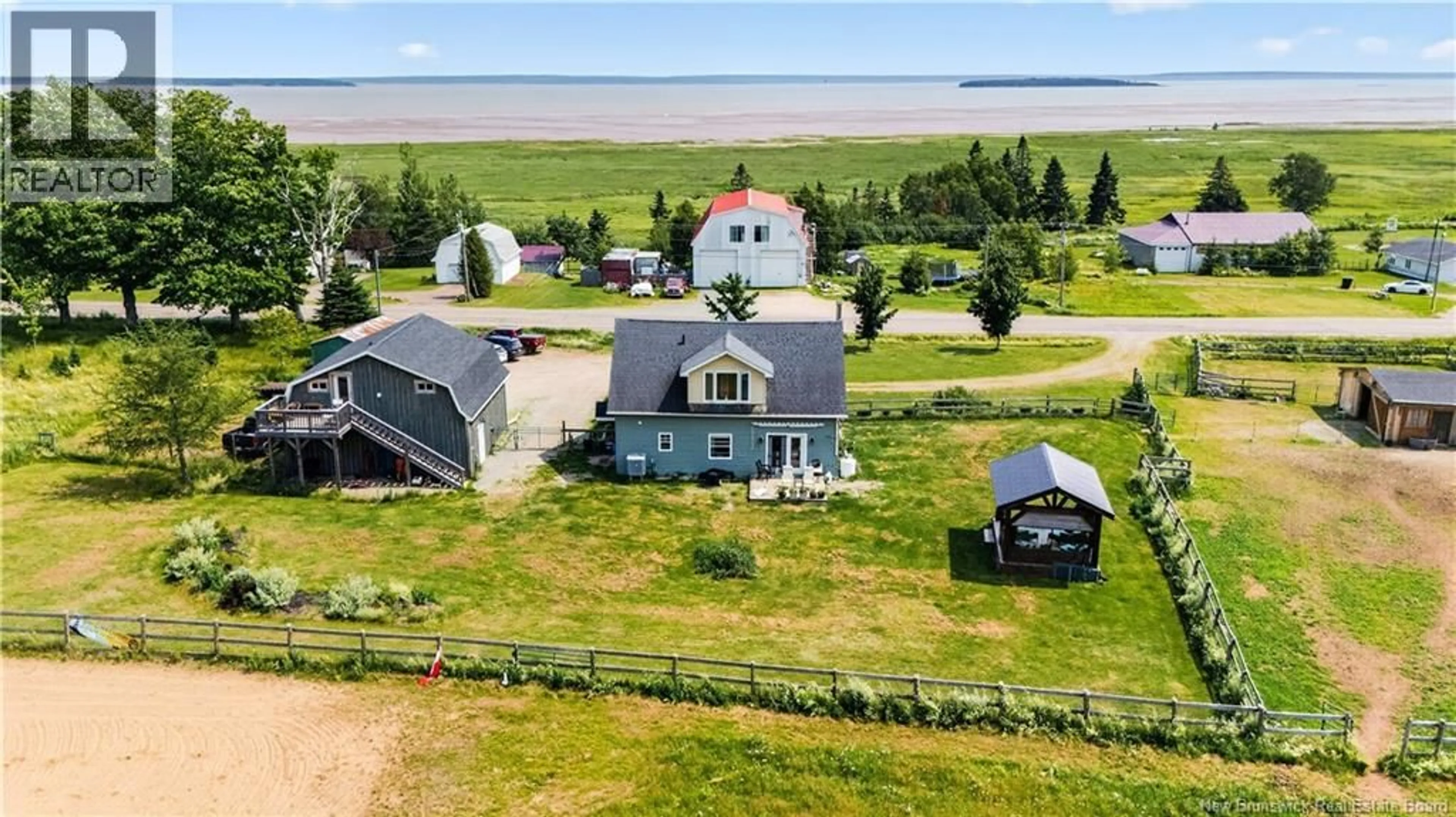 A pic from outside/outdoor area/front of a property/back of a property/a pic from drone, water/lake/river/ocean view for 4948 ROUTE 114, Shepody New Brunswick E4H4K1