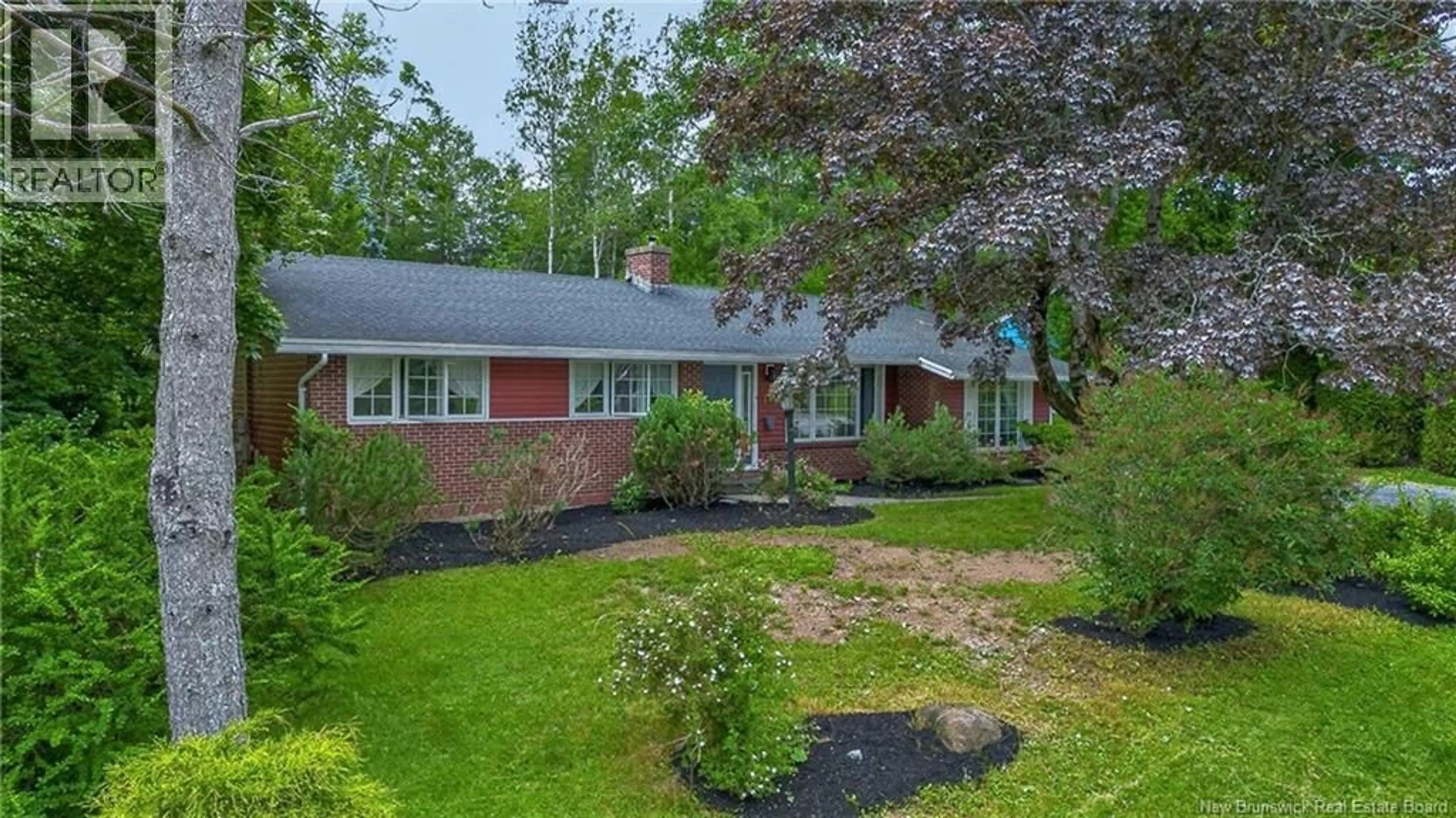 Home with brick exterior material, street for 18 FOREST ROAD, Rothesay New Brunswick E2H1B5