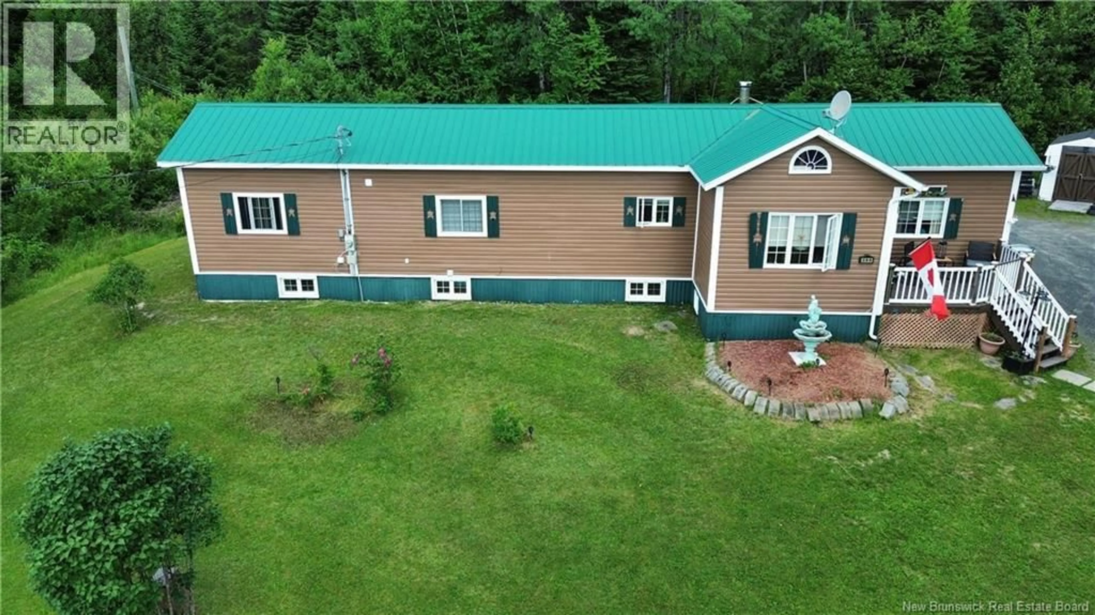 A pic from outside/outdoor area/front of a property/back of a property/a pic from drone, building for 380 RTE 17, Saint-Léonard New Brunswick E7E2L7