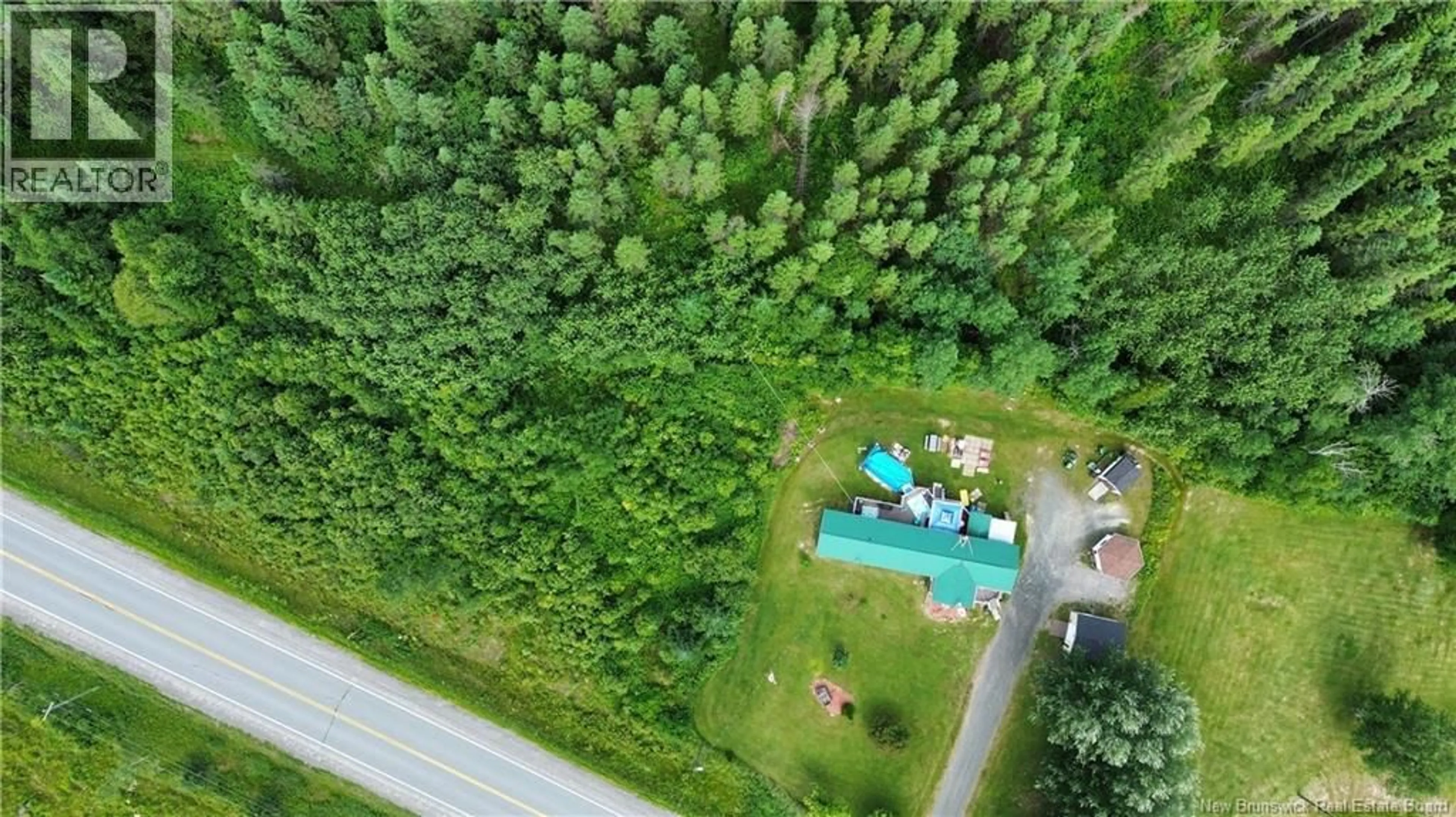 A pic from outside/outdoor area/front of a property/back of a property/a pic from drone, forest/trees view for 380 RTE 17, Saint-Léonard New Brunswick E7E2L7