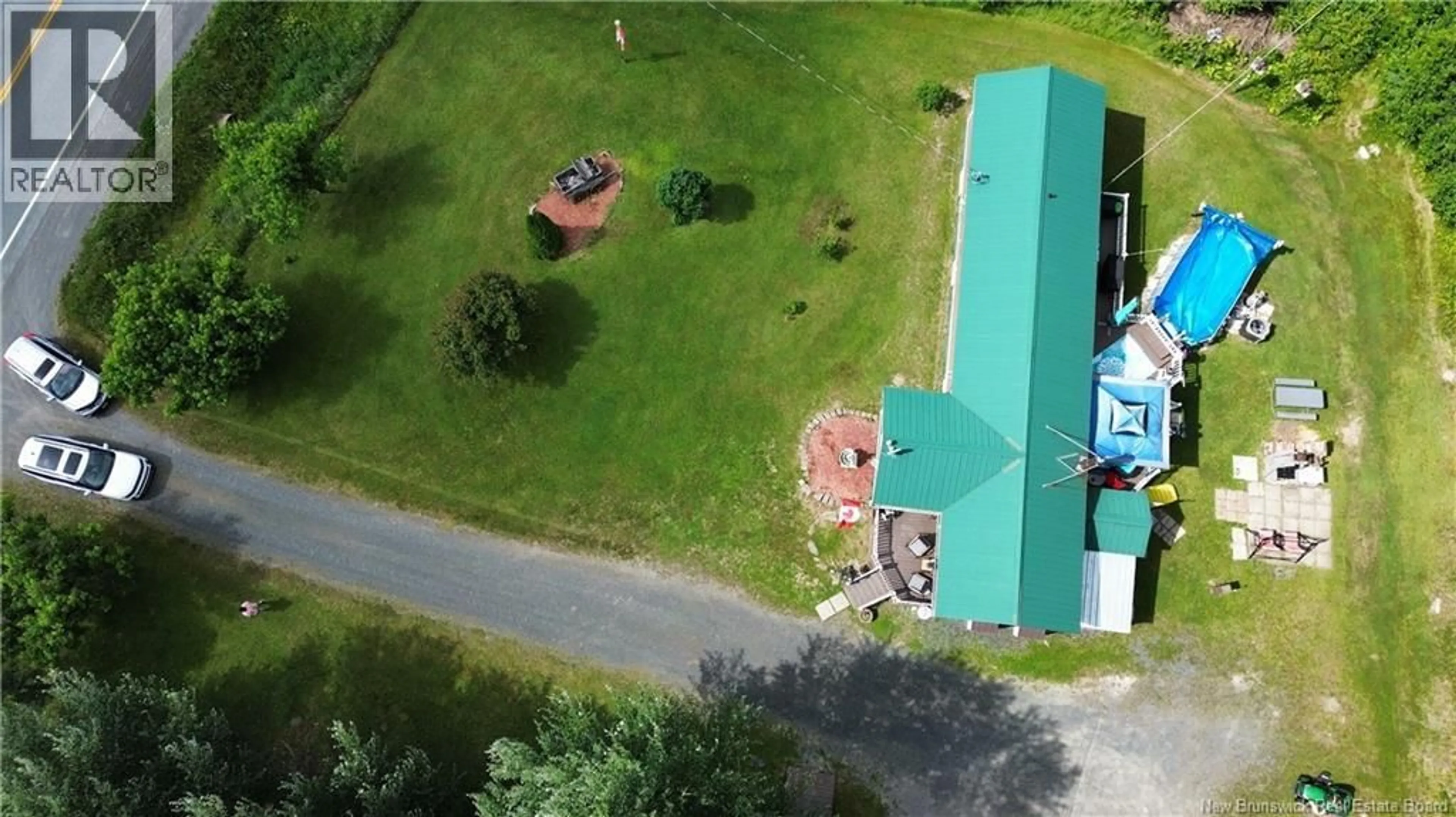 A pic from outside/outdoor area/front of a property/back of a property/a pic from drone, unknown for 380 RTE 17, Saint-Léonard New Brunswick E7E2L7
