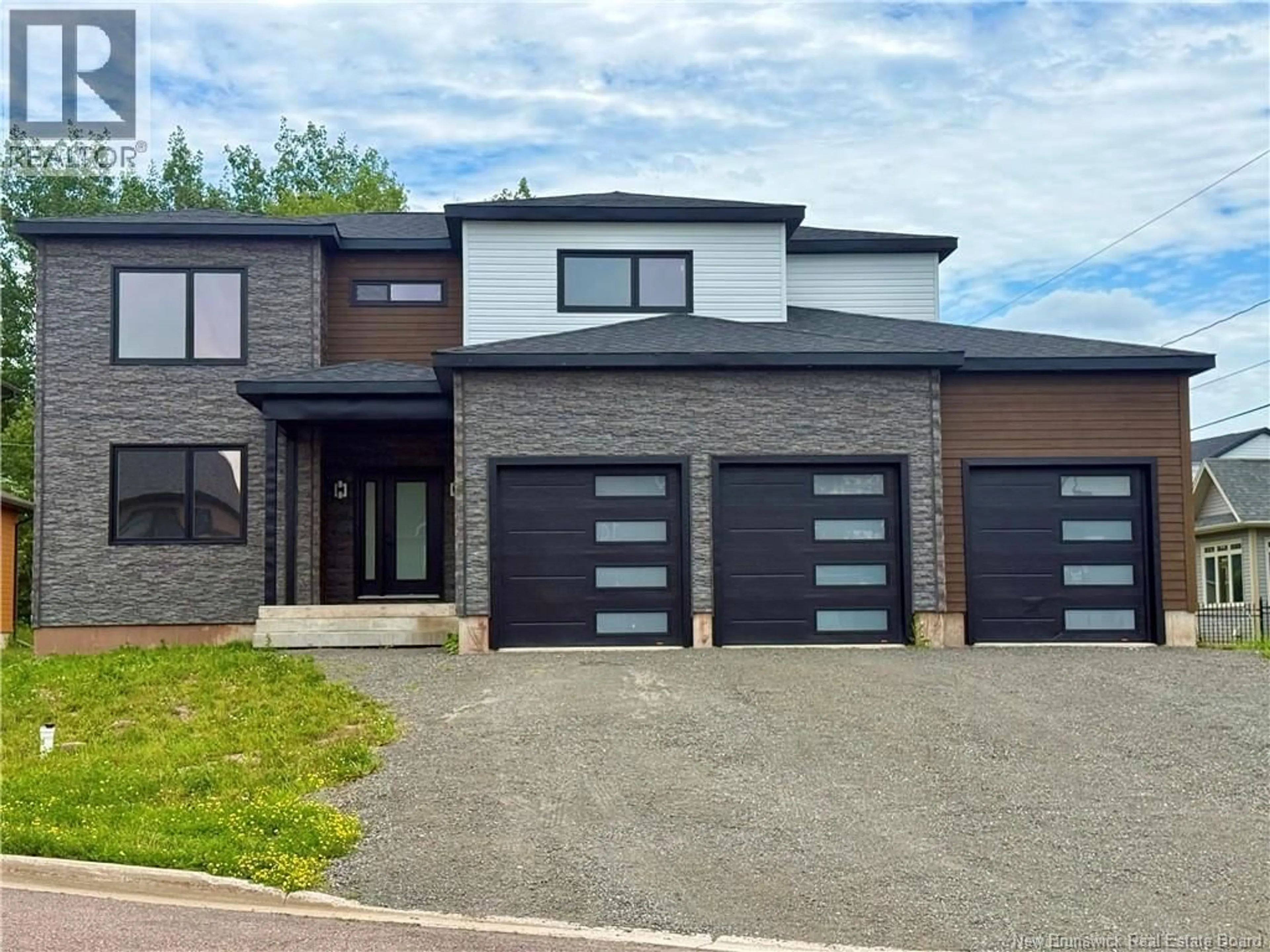 Home with brick exterior material, street for 9 TURNBERRY COURT, Moncton New Brunswick E1G5R8